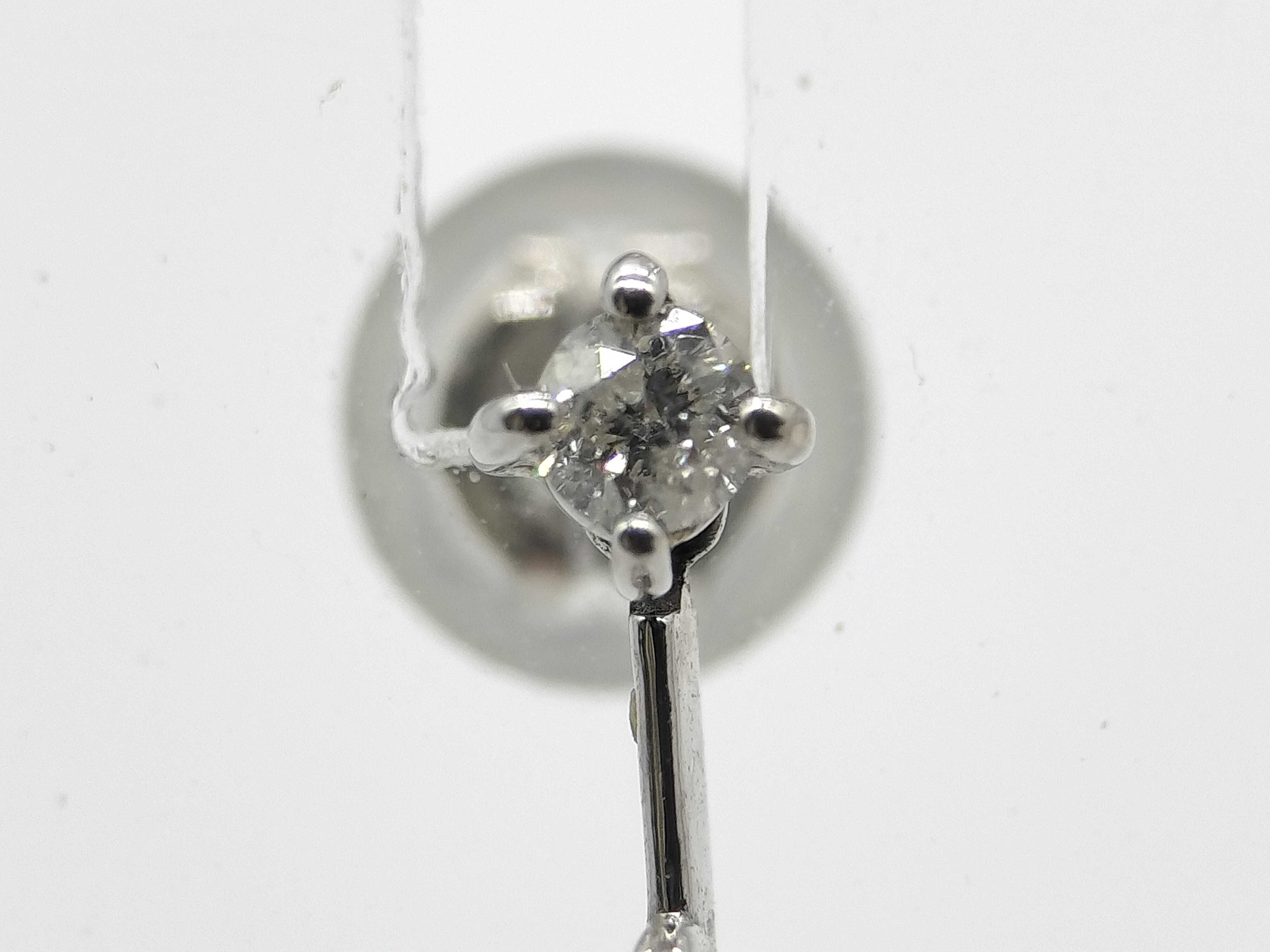 A Pair of 14 Karat White Gold and Diamond Three-Stone Drop Earrings