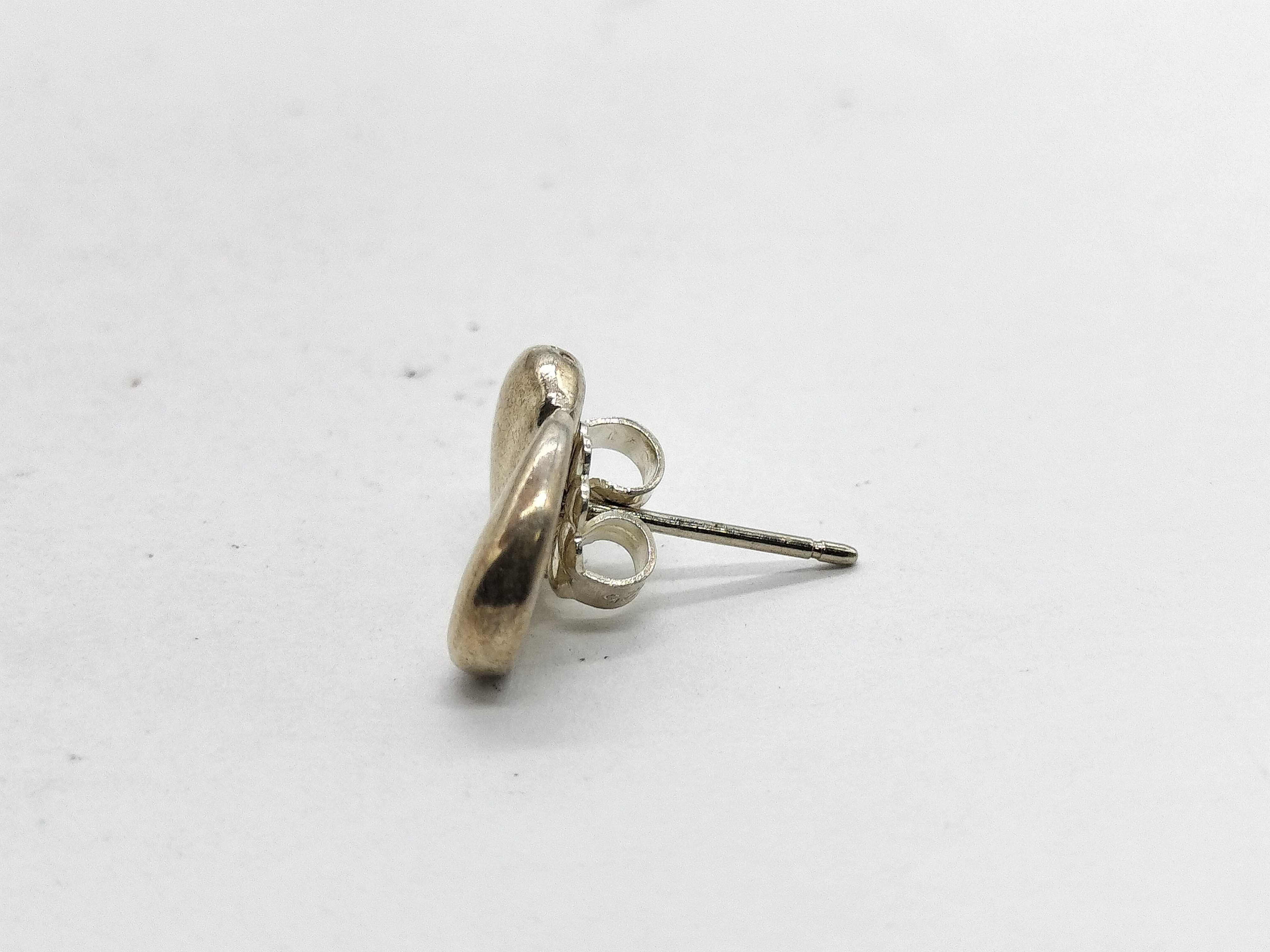 A Pair of Tiffany & Co. Elsa Peretti Sterling Silver Bean Stud Earrings