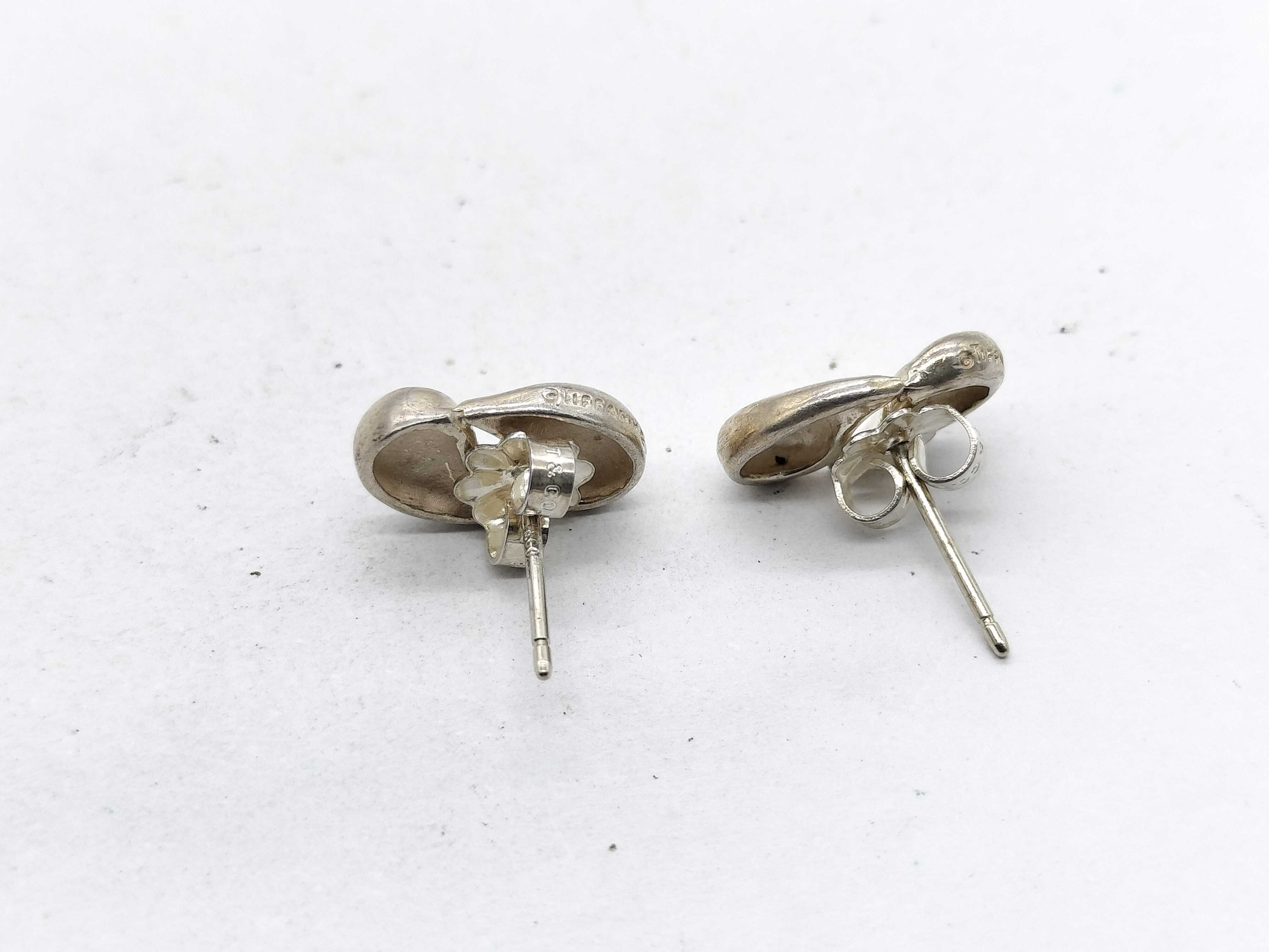 A Pair of Tiffany & Co. Elsa Peretti Sterling Silver Bean Stud Earrings