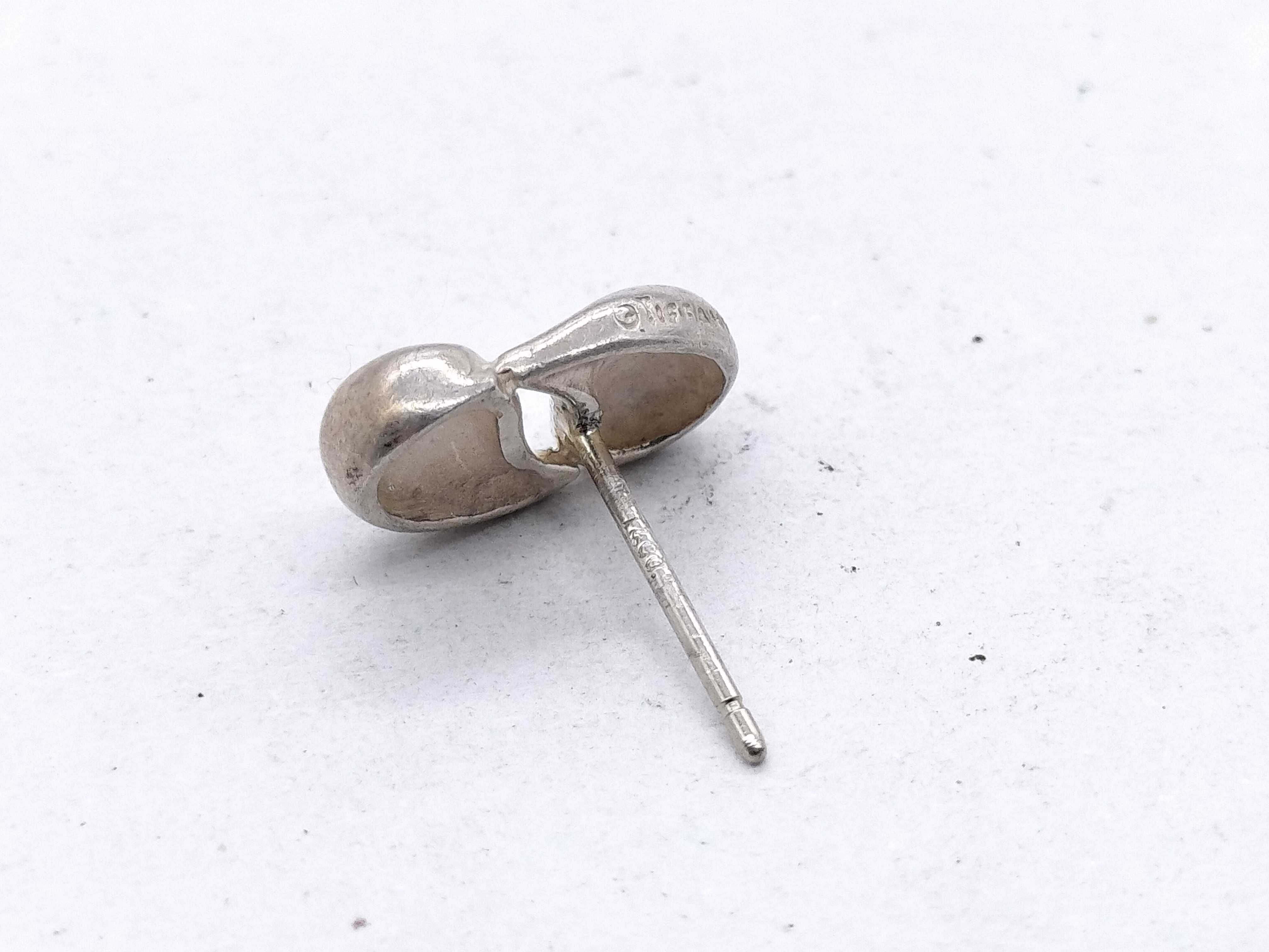 A Pair of Tiffany & Co. Elsa Peretti Sterling Silver Bean Stud Earrings