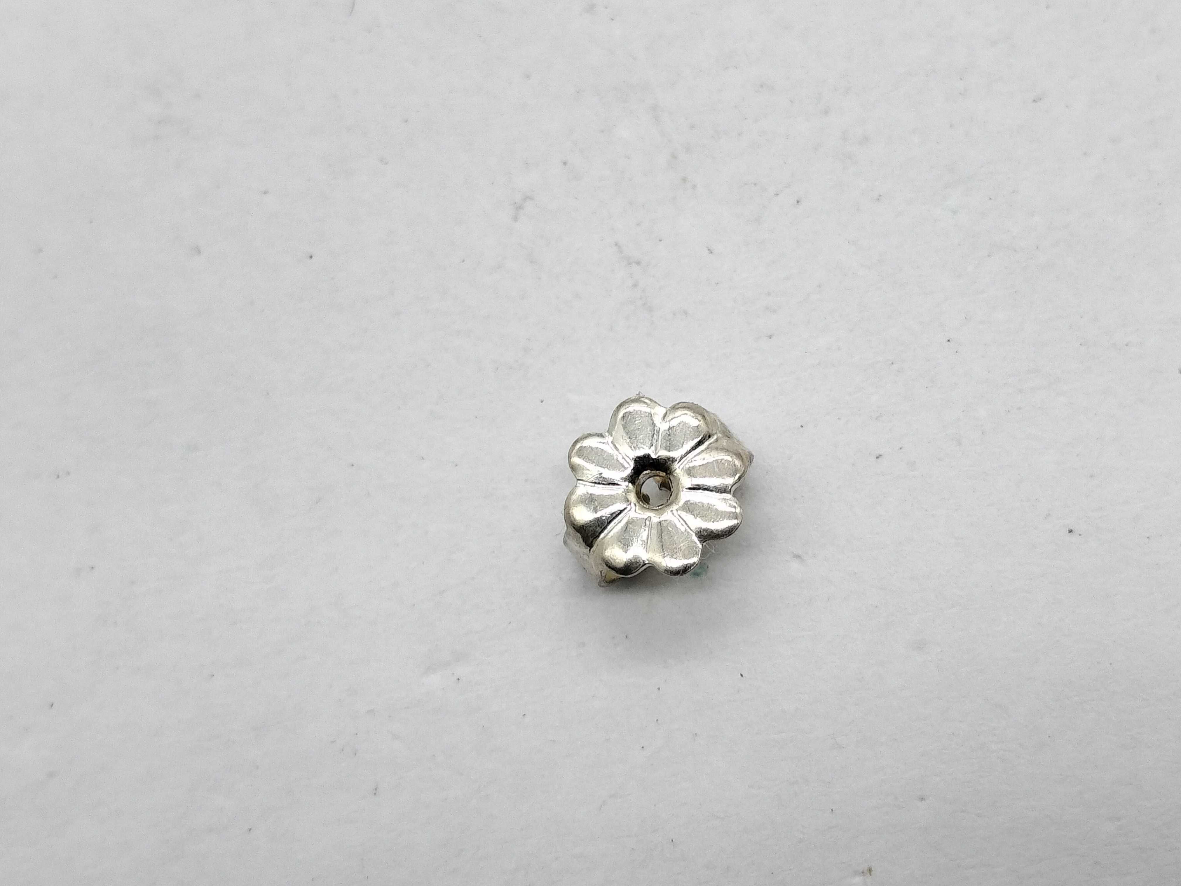 A Pair of Tiffany & Co. Elsa Peretti Sterling Silver Bean Stud Earrings