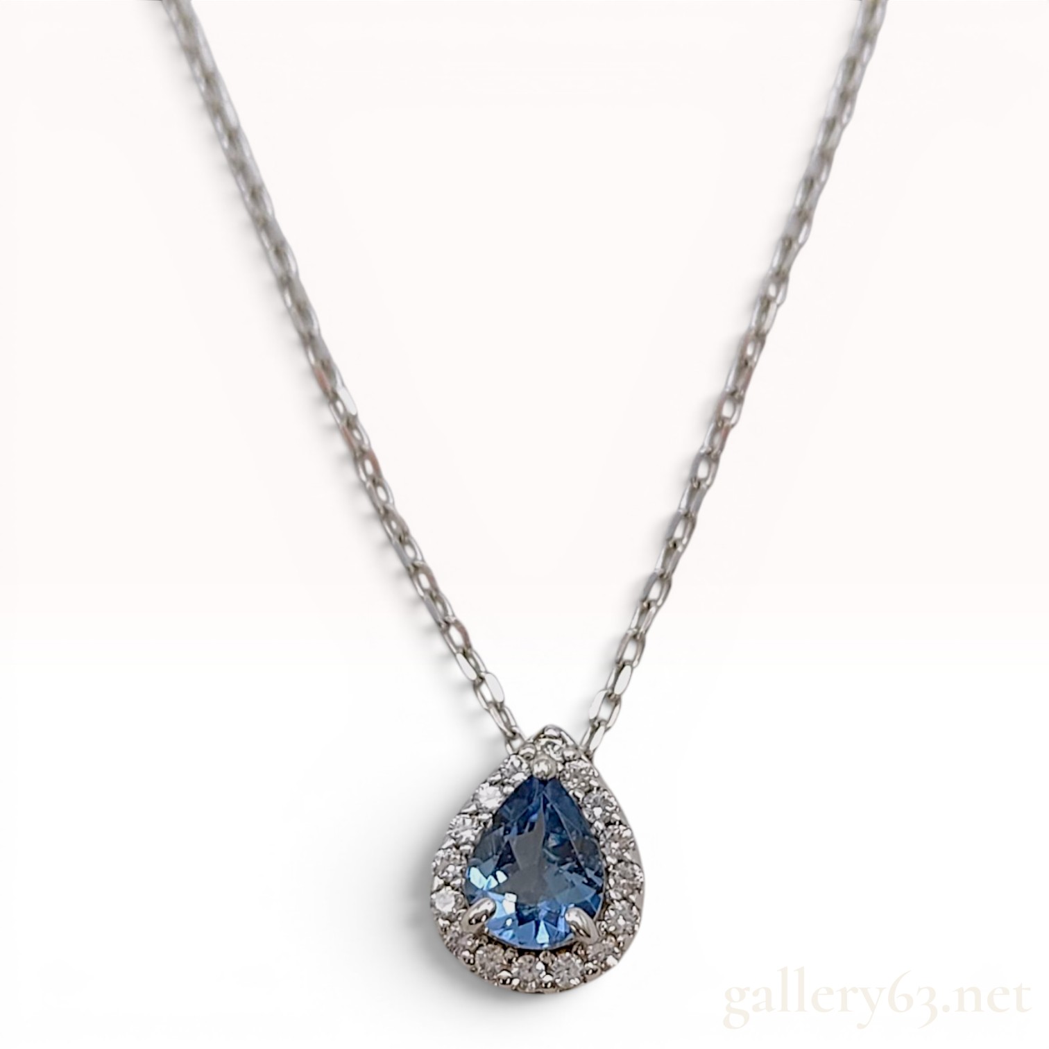 10K White Gold Pear-Cut London Blue Topaz Halo Pendant Necklace