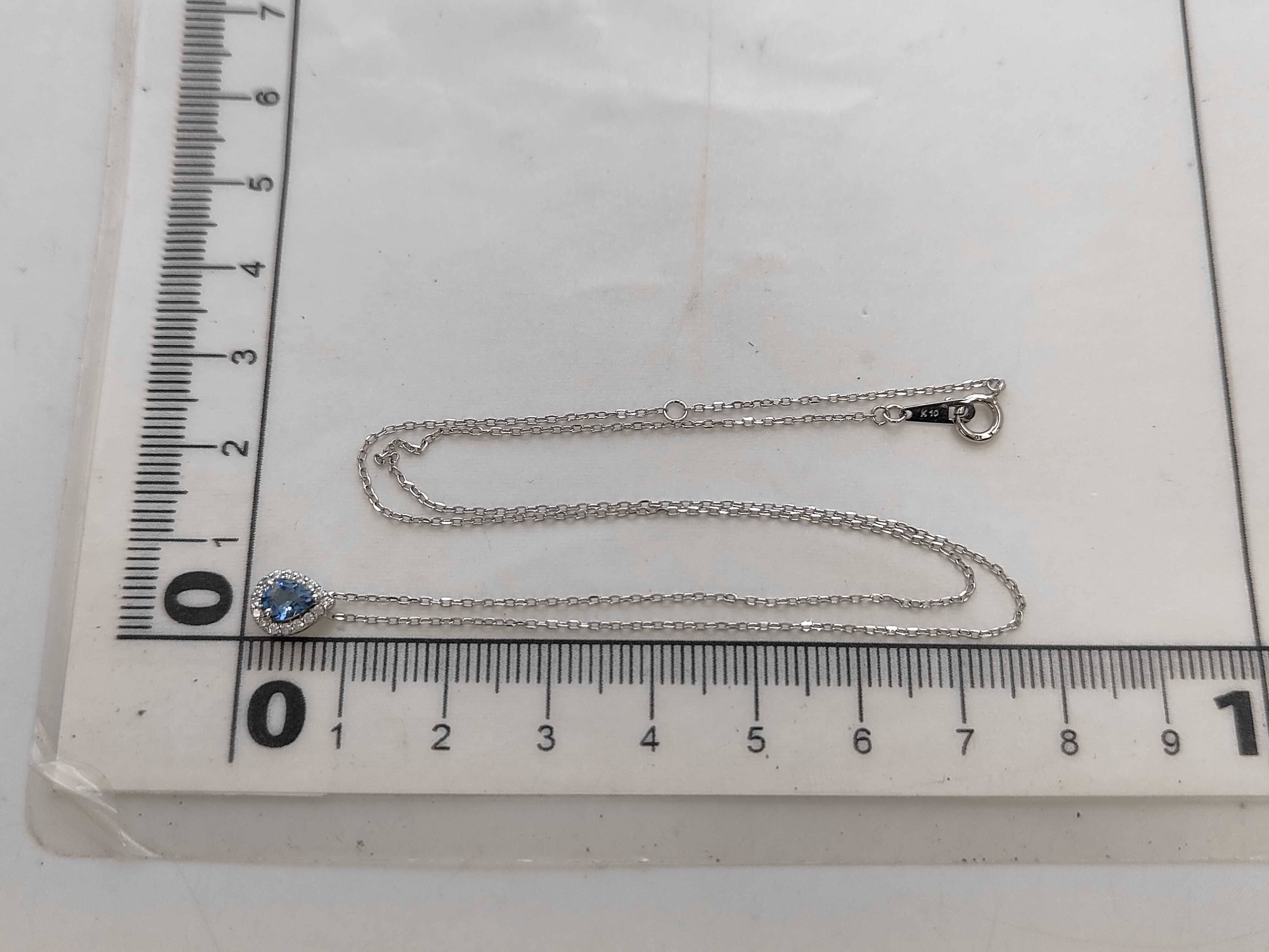 10K White Gold Pear-Cut London Blue Topaz Halo Pendant Necklace