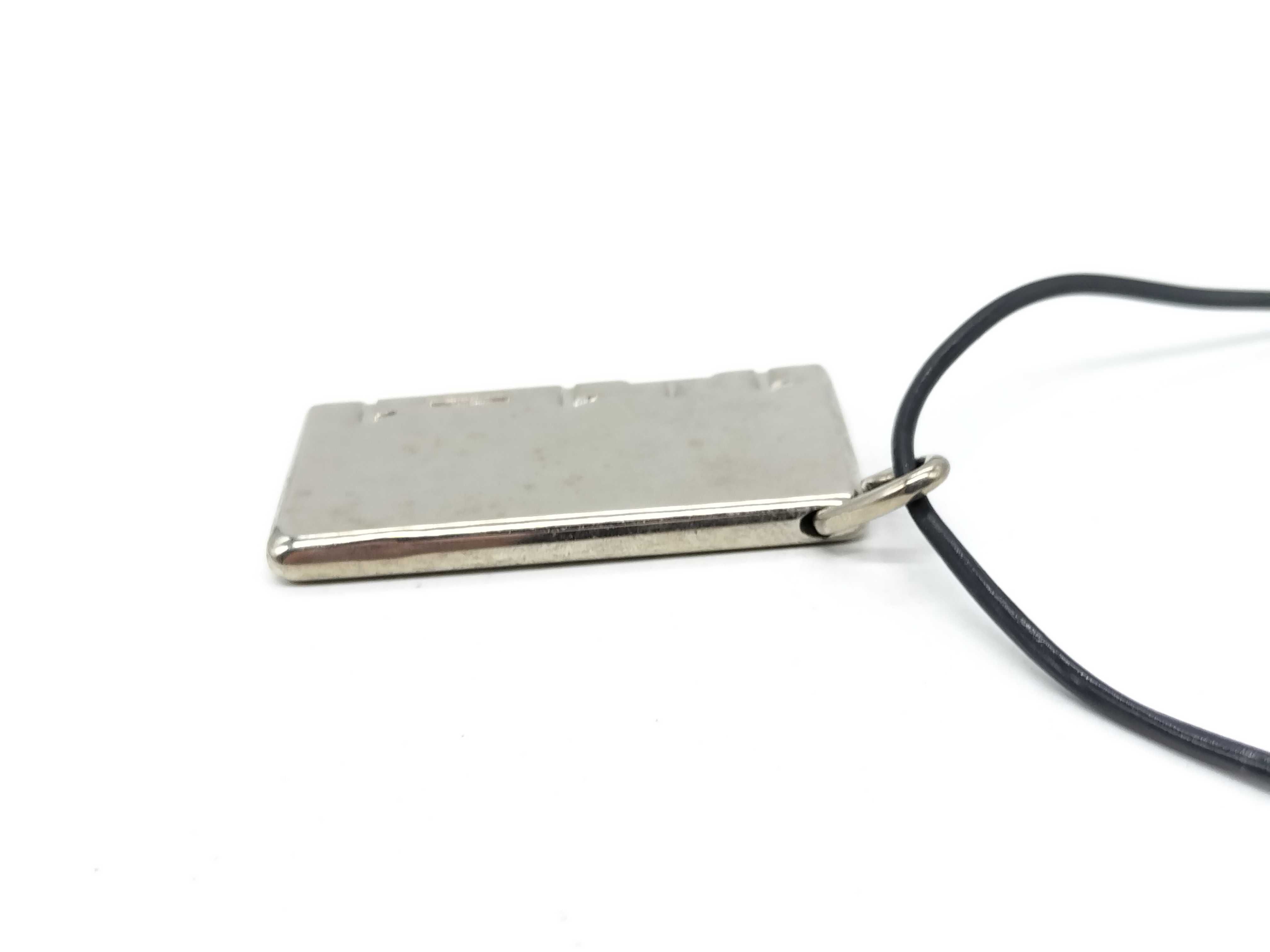 A Pair of Hermes Symbole 1+1=1 Interlocking Pendant Necklaces