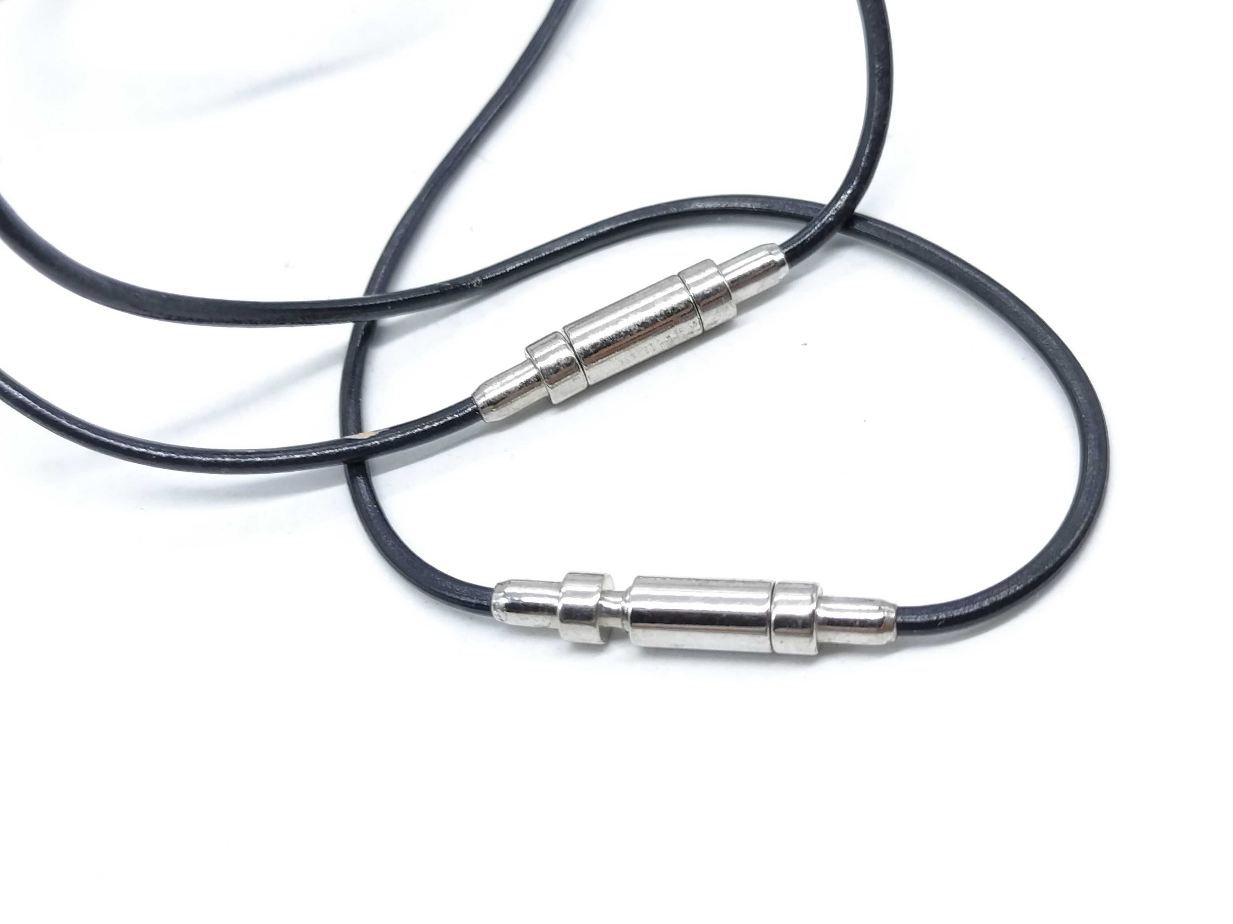 A Pair of Hermes Symbole 1+1=1 Interlocking Pendant Necklaces