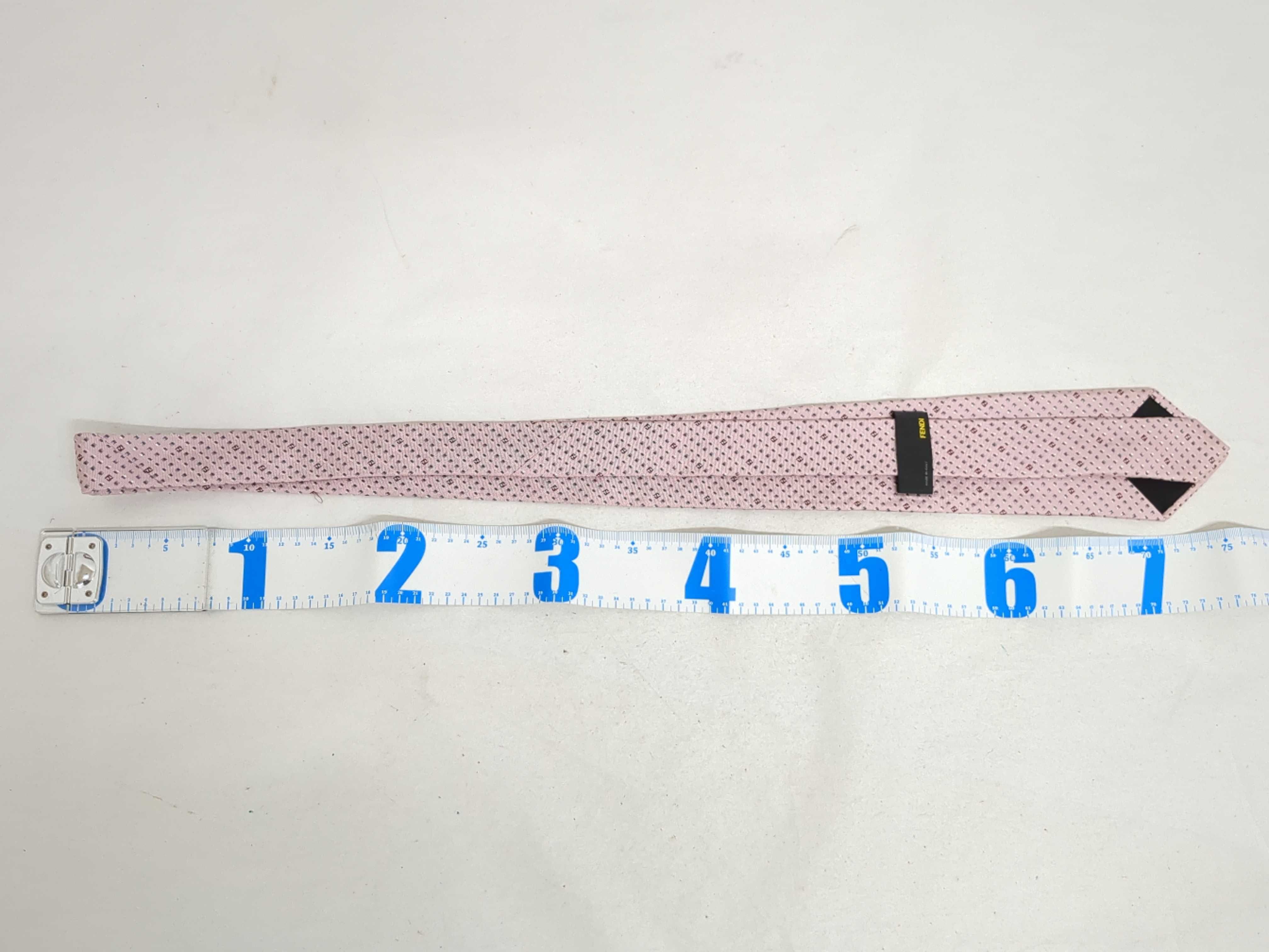 A Group of Five Designer Silk Neckties Including Fendi, Celine, and Yves Saint Laurent