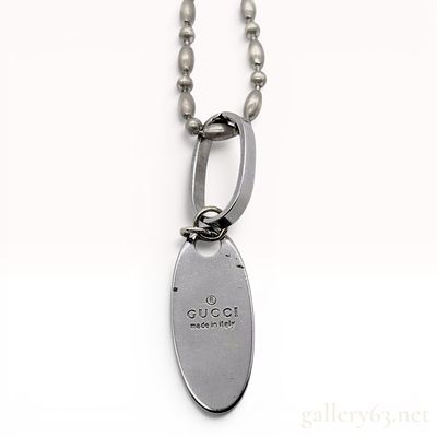 Gucci Trademark Sterling Silver Oval Tag Pendant Necklace with Box. A sterling silver pendant 