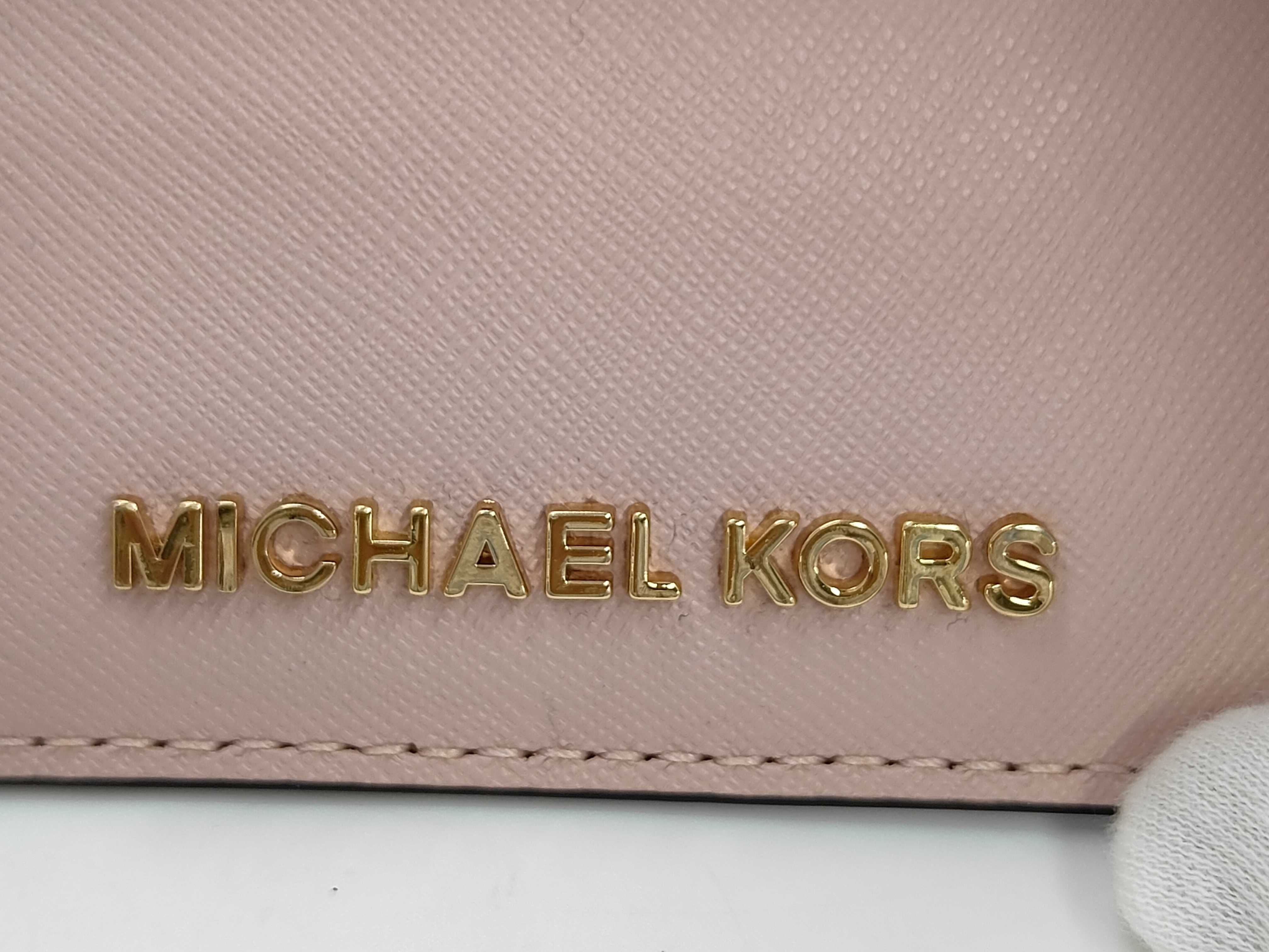 A Collection of Michael Kors and Coach Fashion Accessories