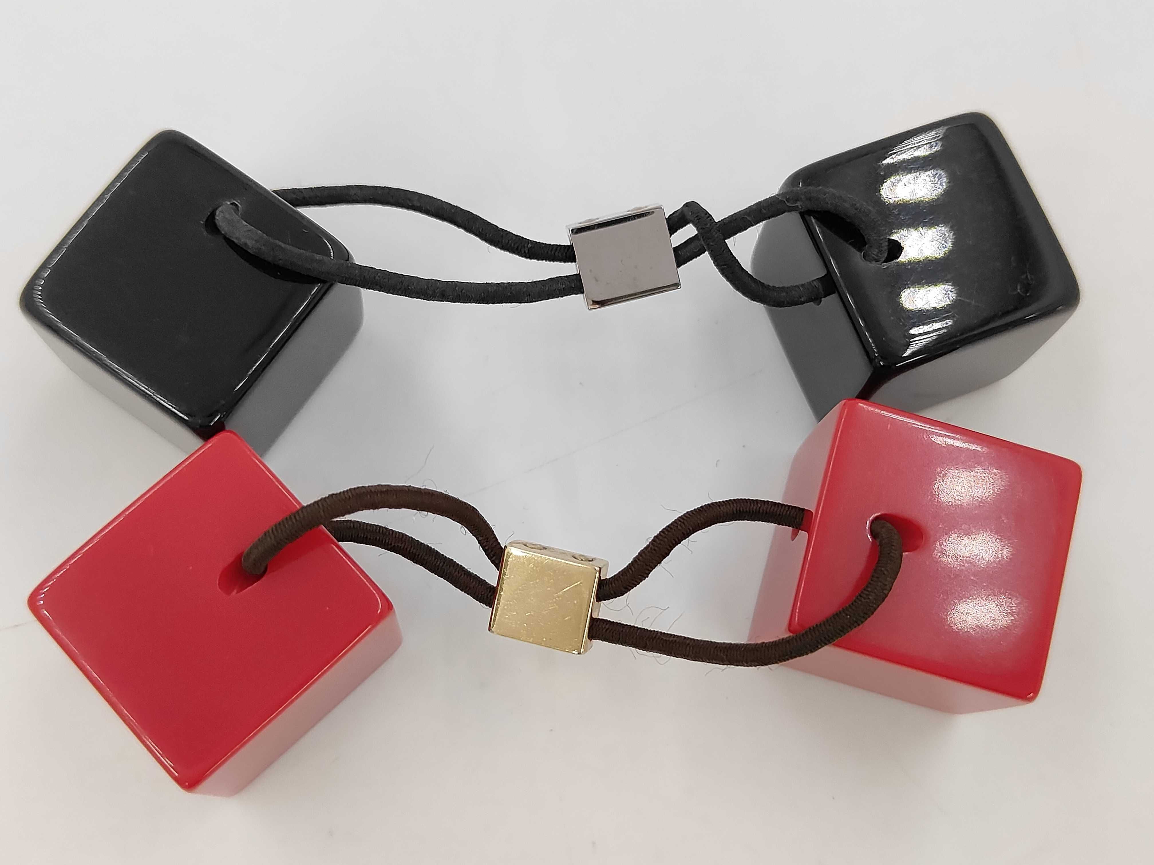 A Pair of Louis Vuitton Resin Hair Cube Elastics