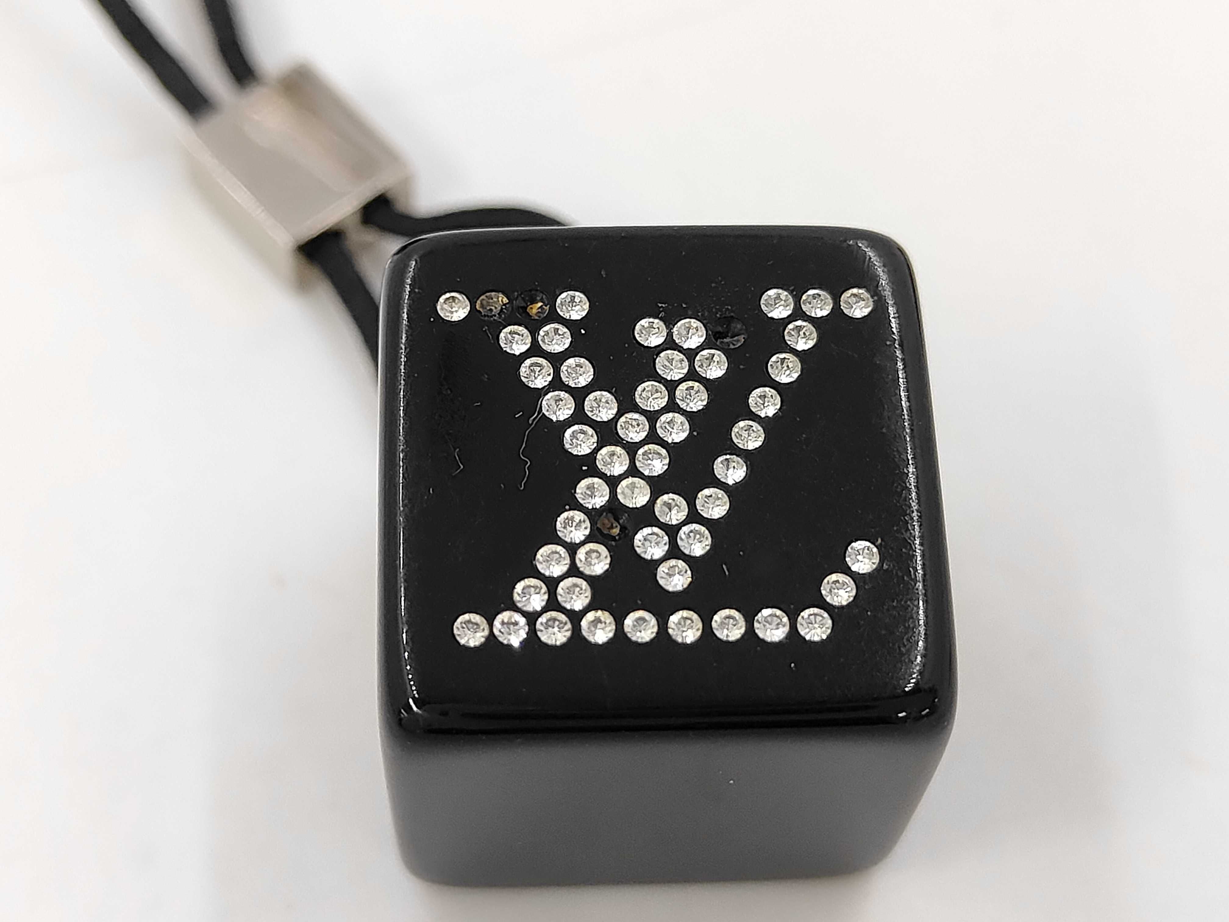 A Pair of Louis Vuitton Resin Hair Cube Elastics