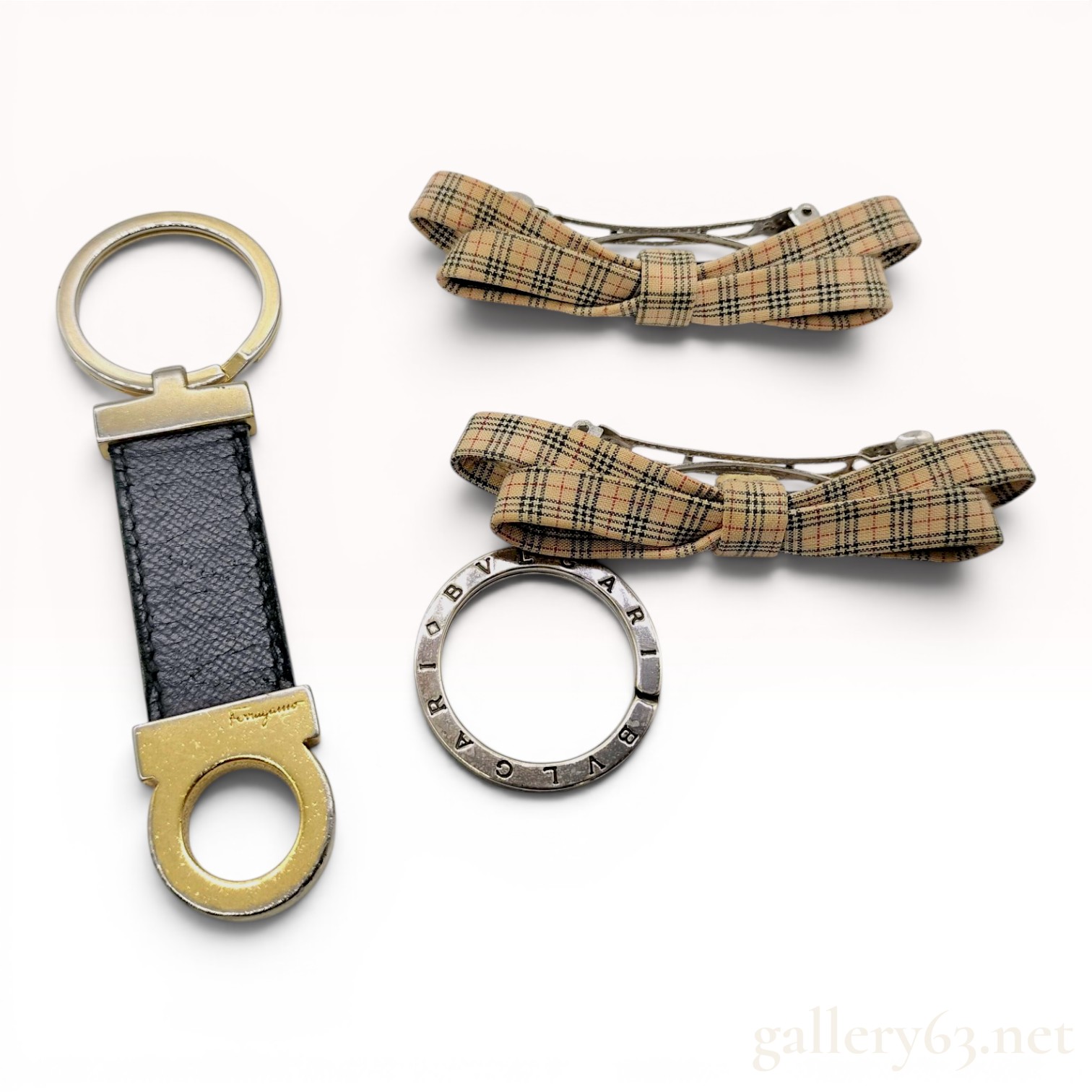 An Assortment of Designer Fashion Accessories Including Salvatore Ferragamo Bvlgari and Burberry