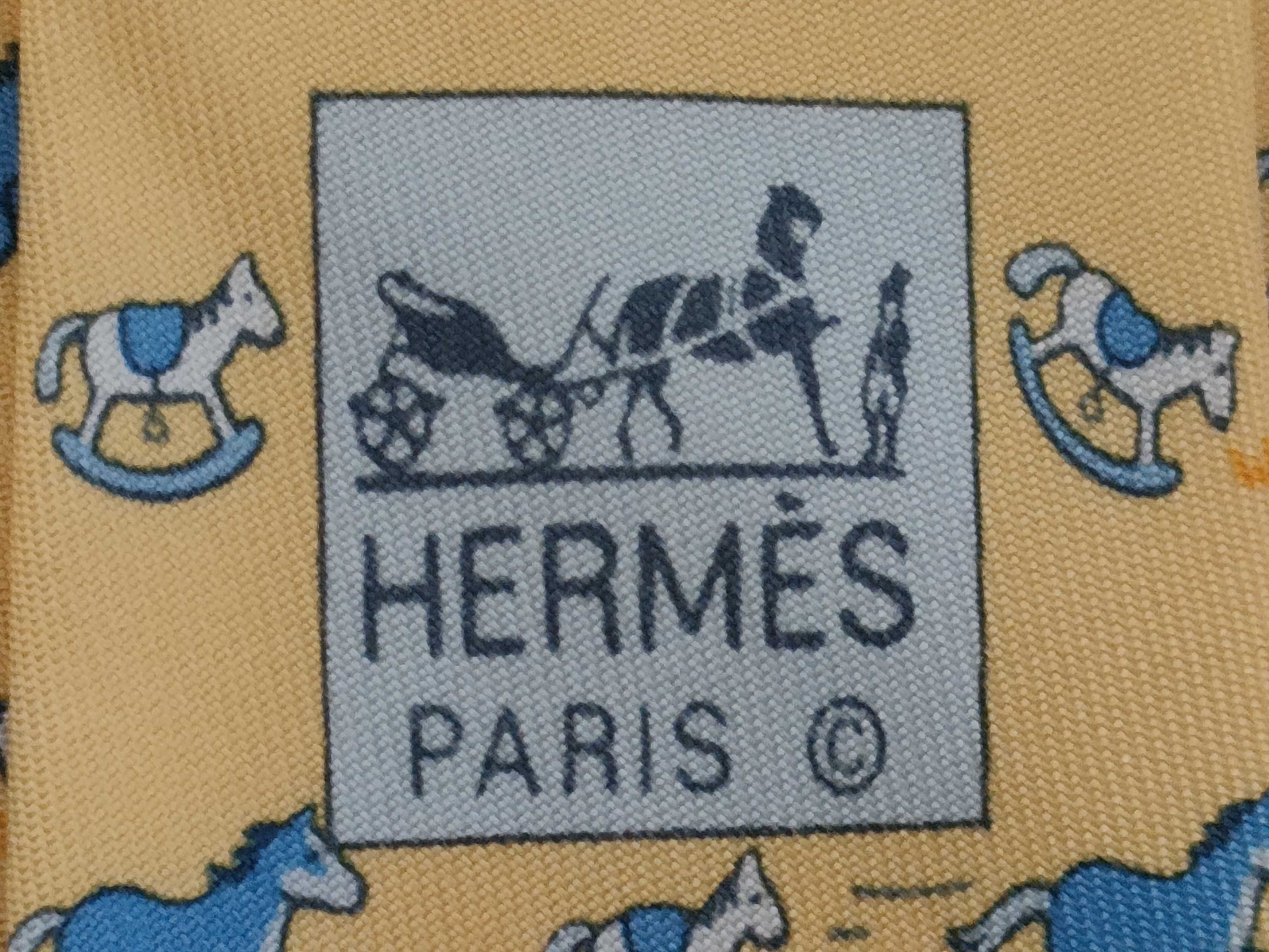 Hermes Yellow Silk Necktie with Repeating Horse Pattern