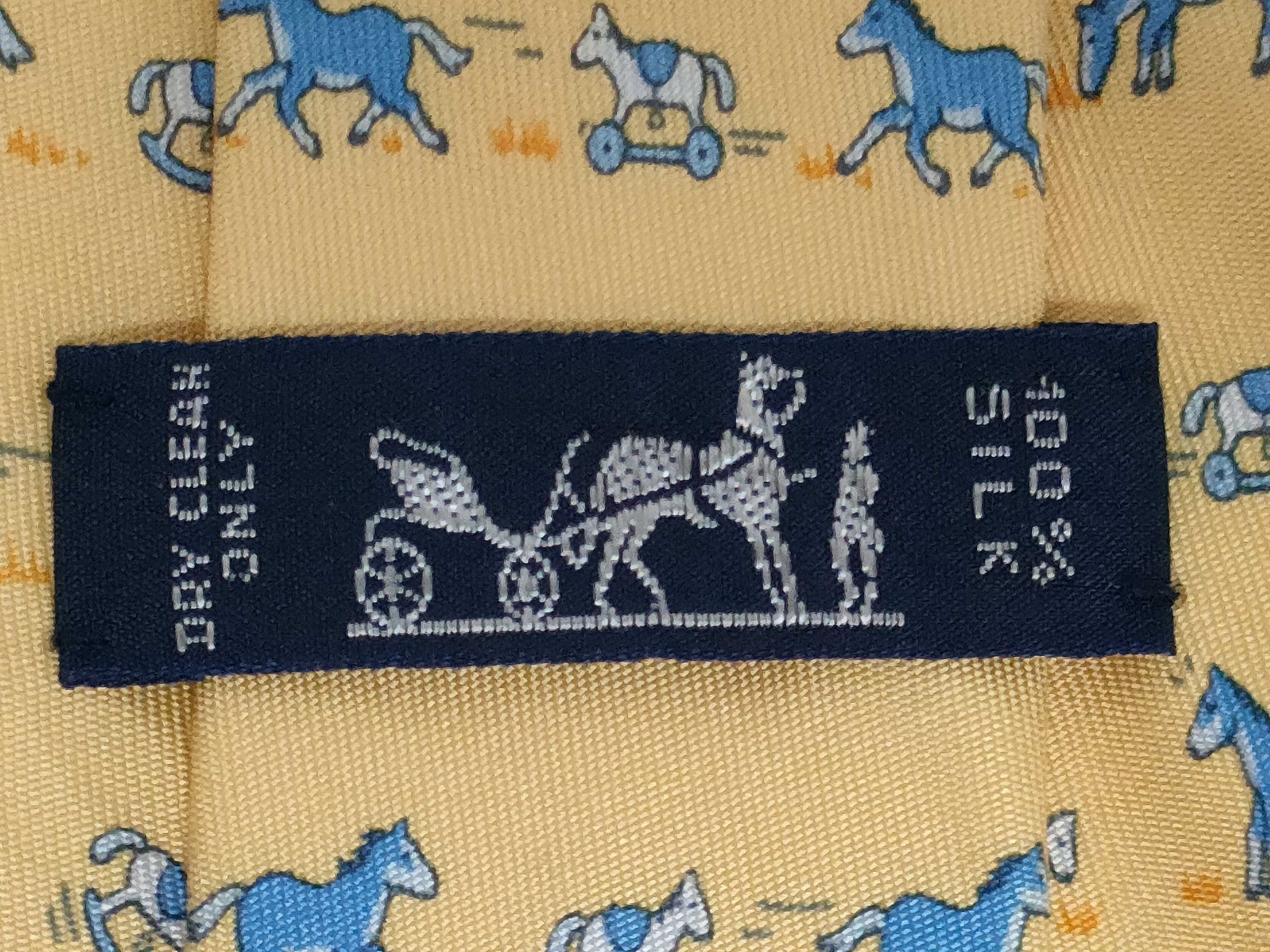 Hermes Yellow Silk Necktie with Repeating Horse Pattern