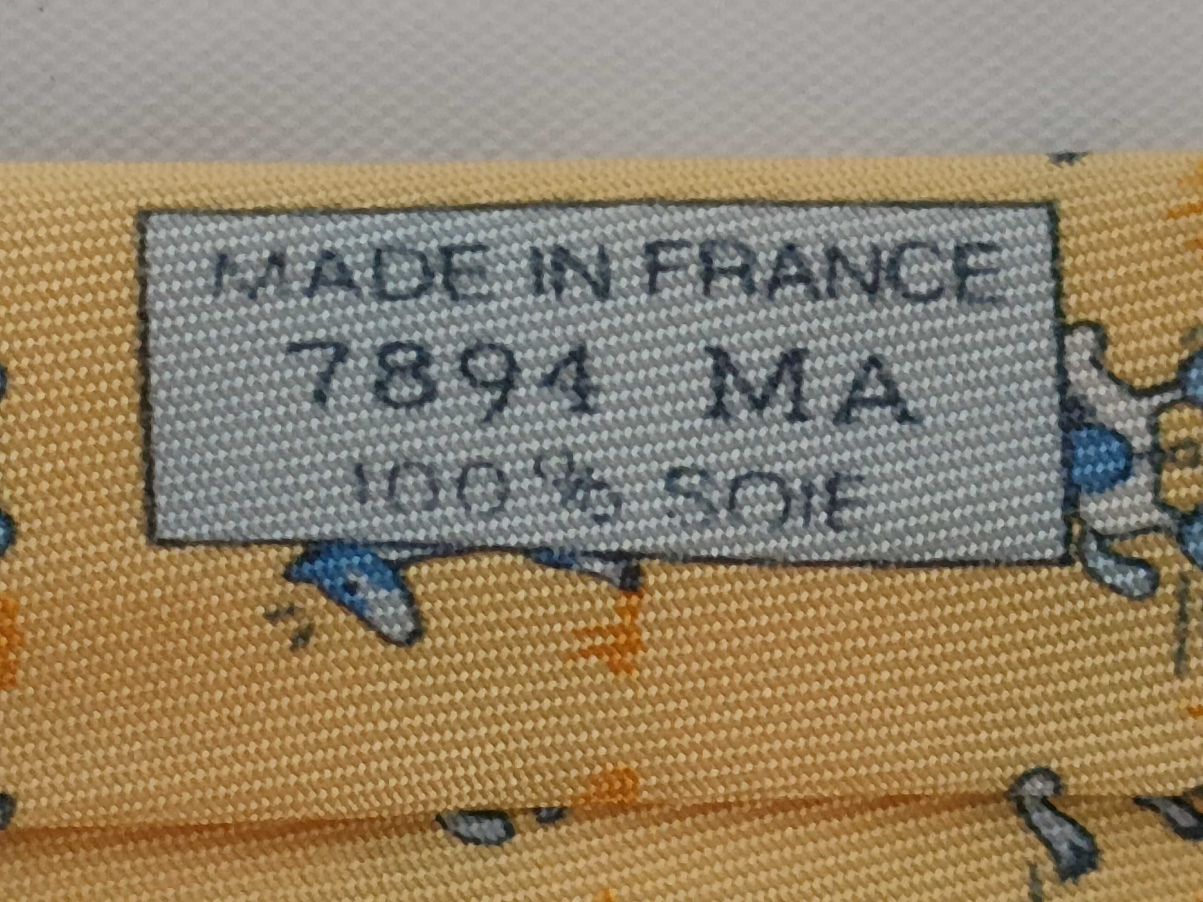 Hermes Yellow Silk Necktie with Repeating Horse Pattern