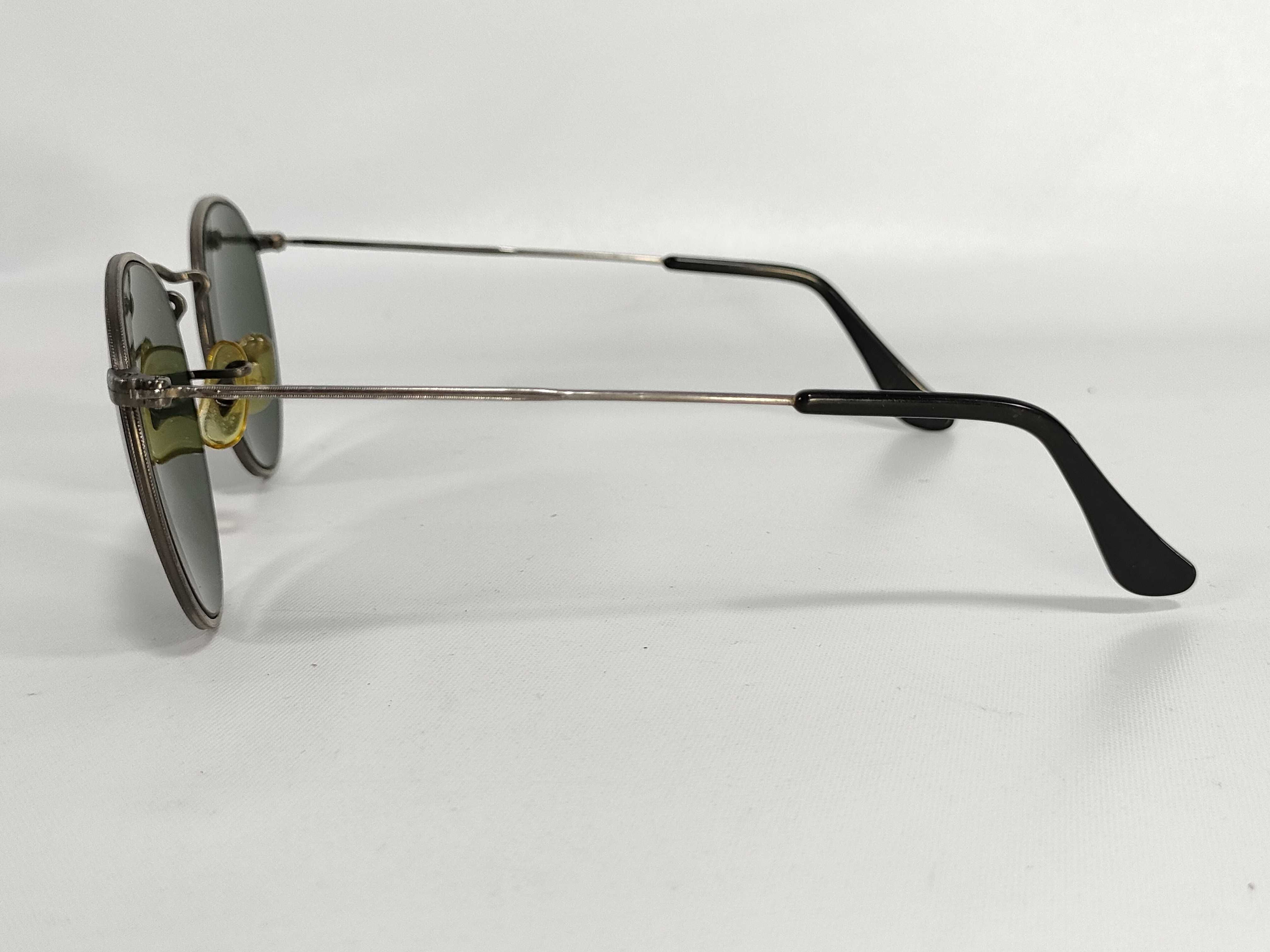 A Pair of Vintage Bausch and Lomb Ray-Ban W1295 Oval Metal Sunglasses