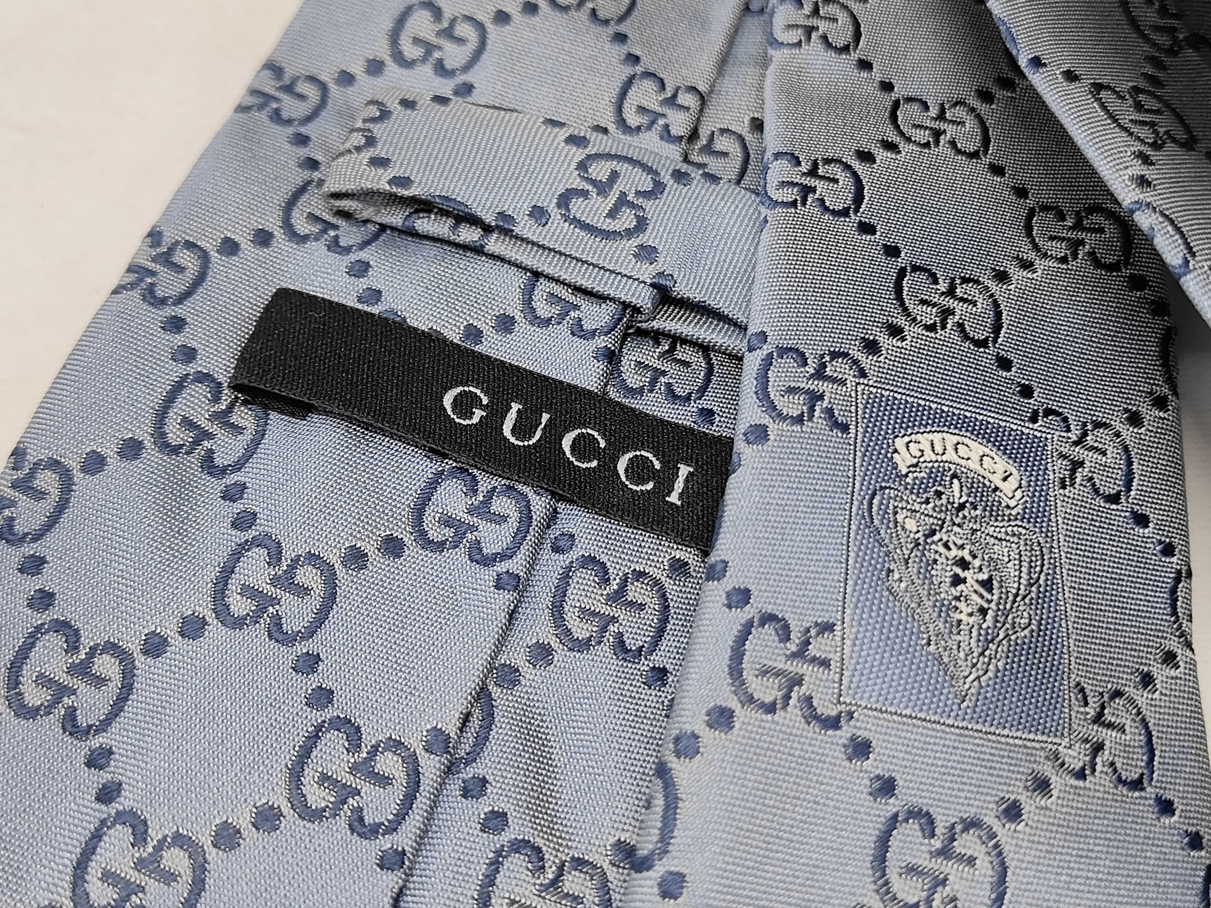 A Trio of Luxury Designer Silk Neckties Including Gucci, Louis Vuitton, and Christian Dior