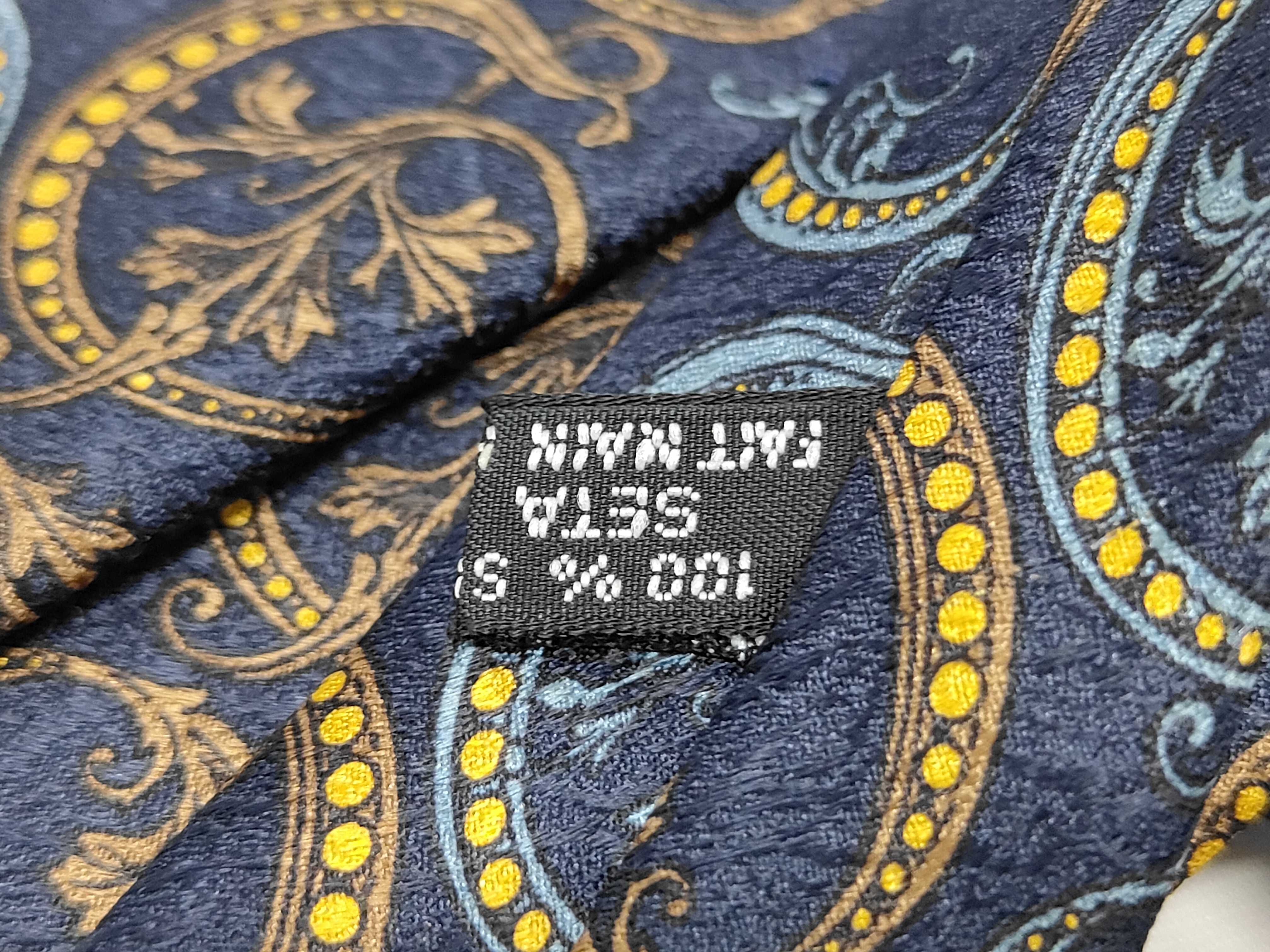 A Trio of Luxury Designer Silk Neckties Including Gucci, Louis Vuitton, and Christian Dior