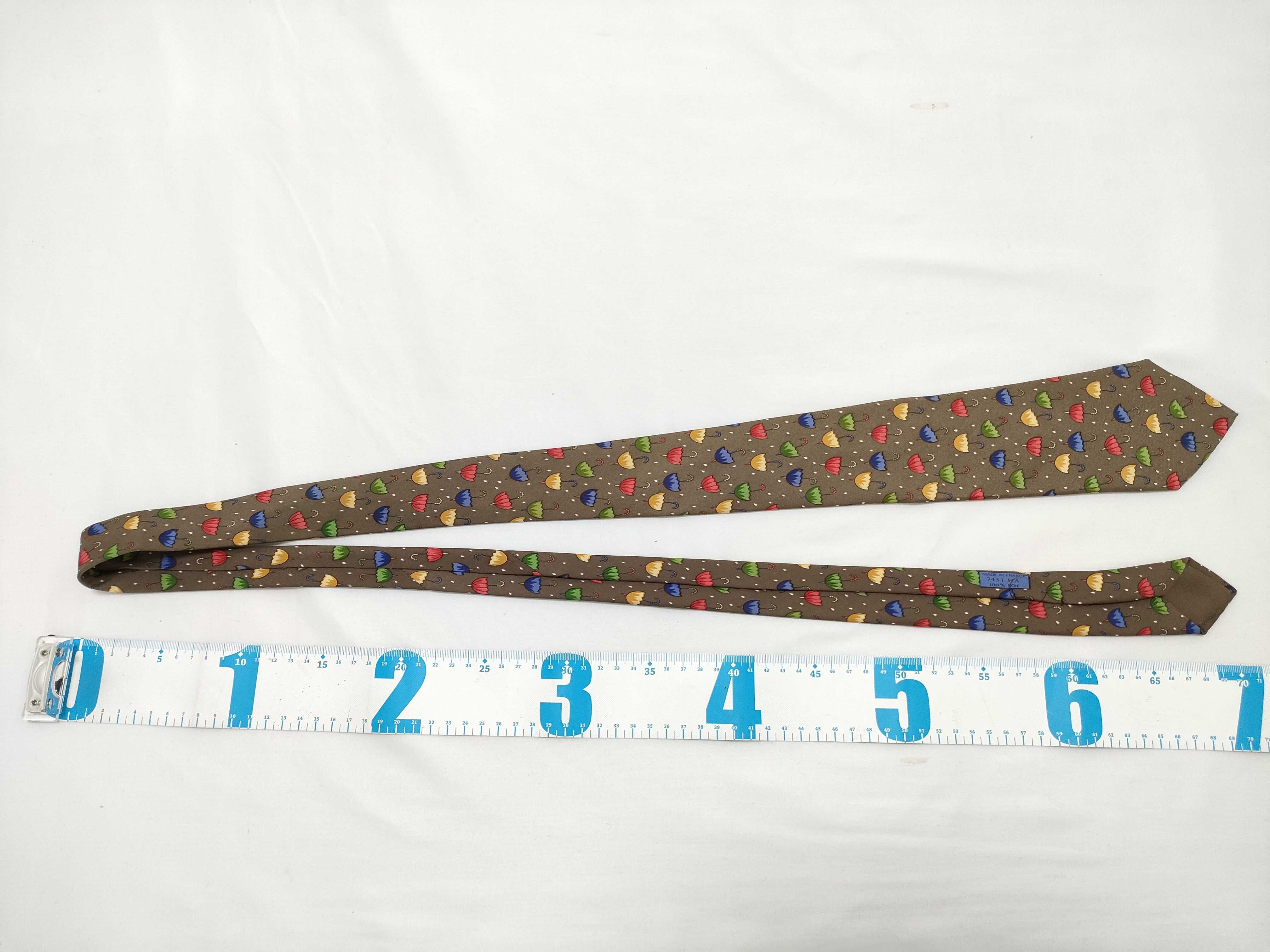 Two Hermes Silk Neckties Featuring Umbrella and Geometric Patterns