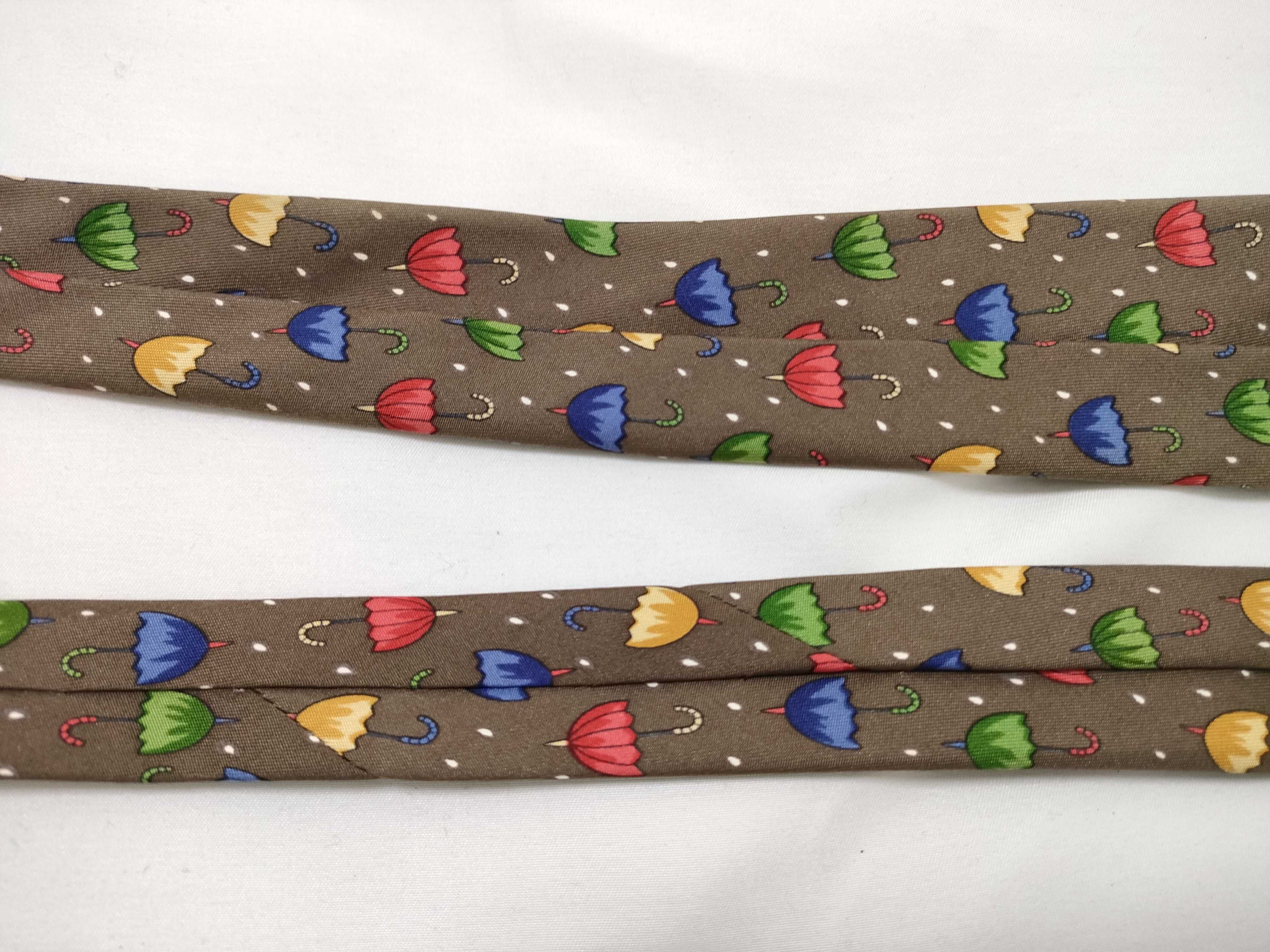 Two Hermes Silk Neckties Featuring Umbrella and Geometric Patterns