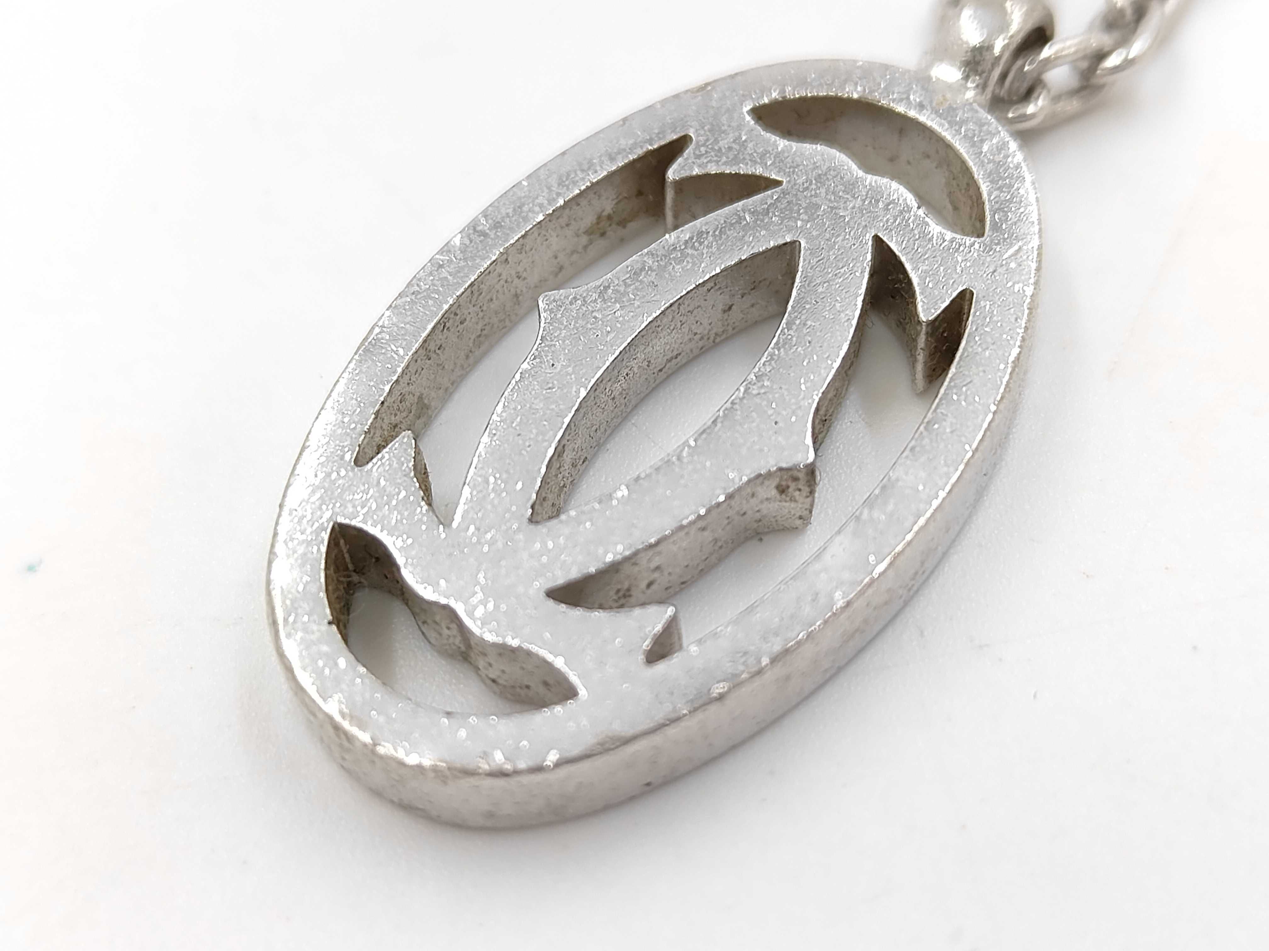 Cartier silver toned metal Double C logo bag charm