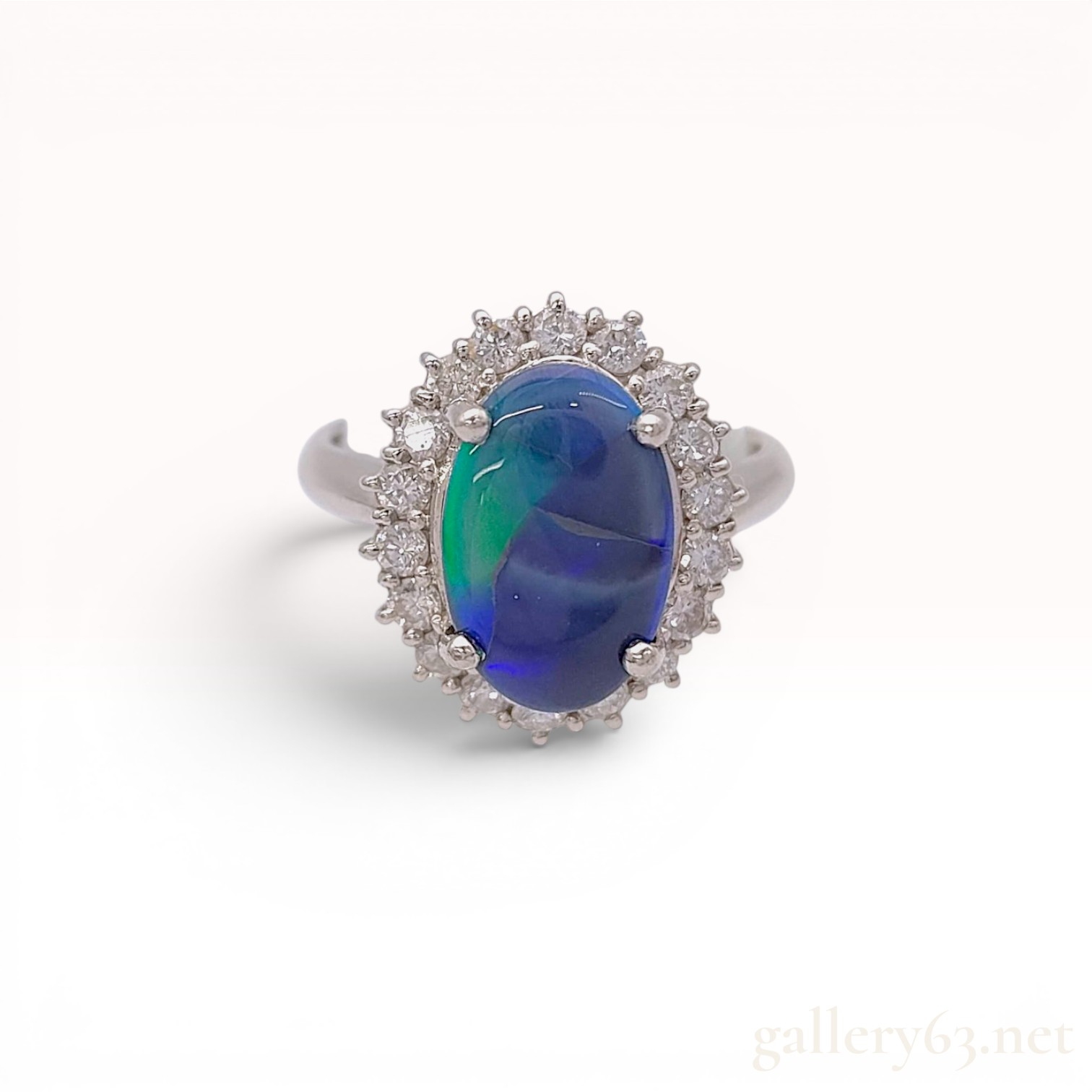 Platinum Black Opal and Diamond Halo Ring
