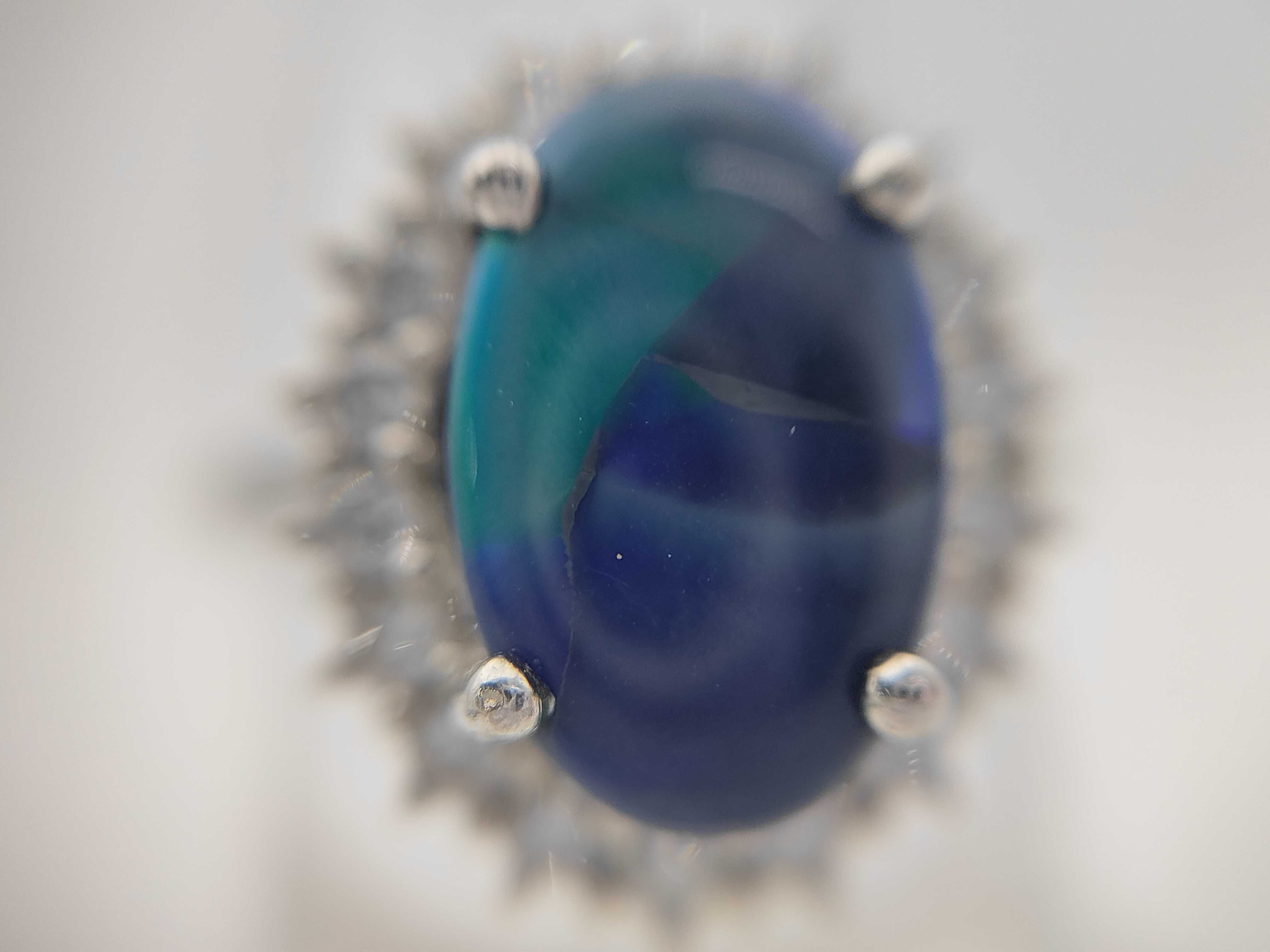 Platinum Black Opal and Diamond Halo Ring