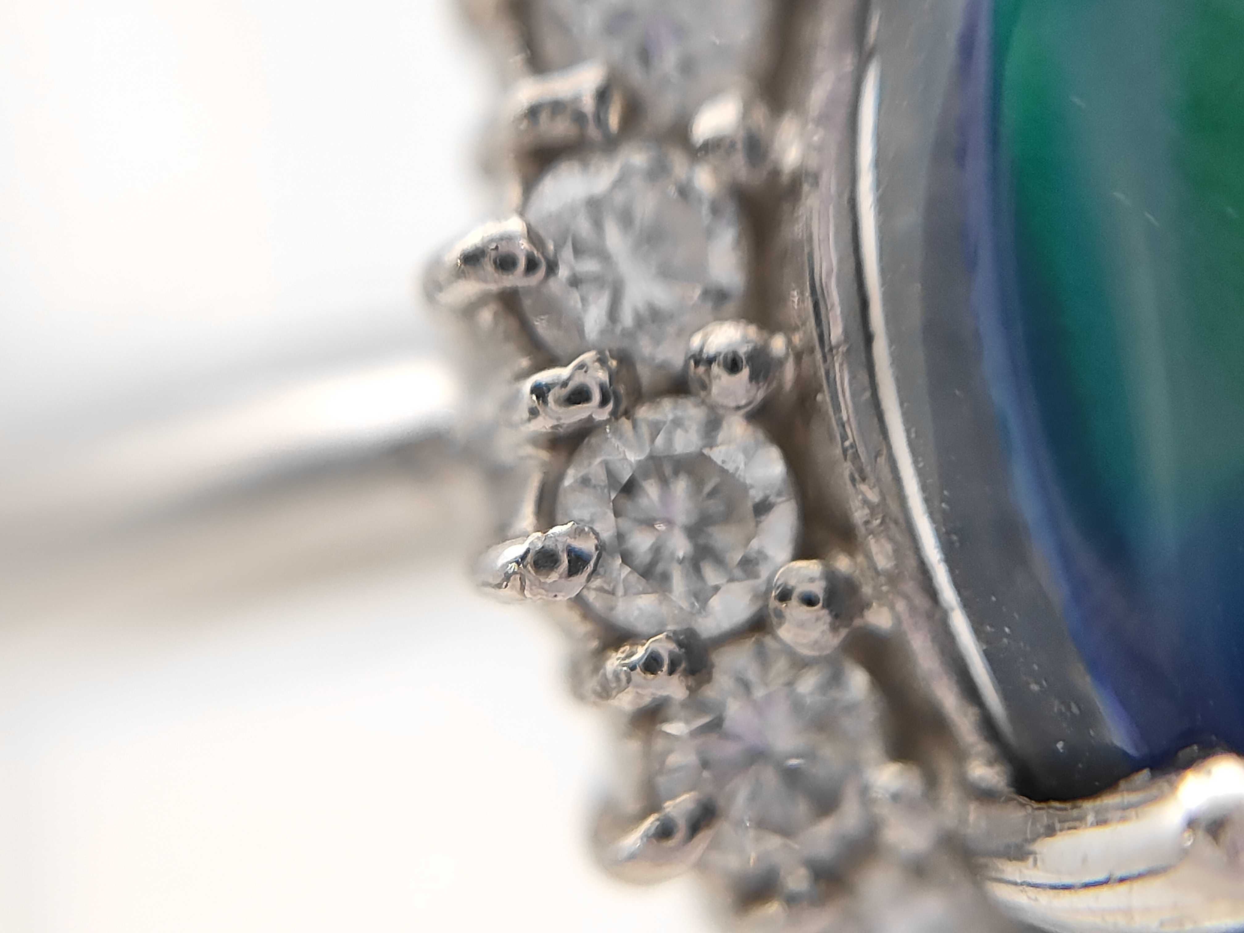 Platinum Black Opal and Diamond Halo Ring