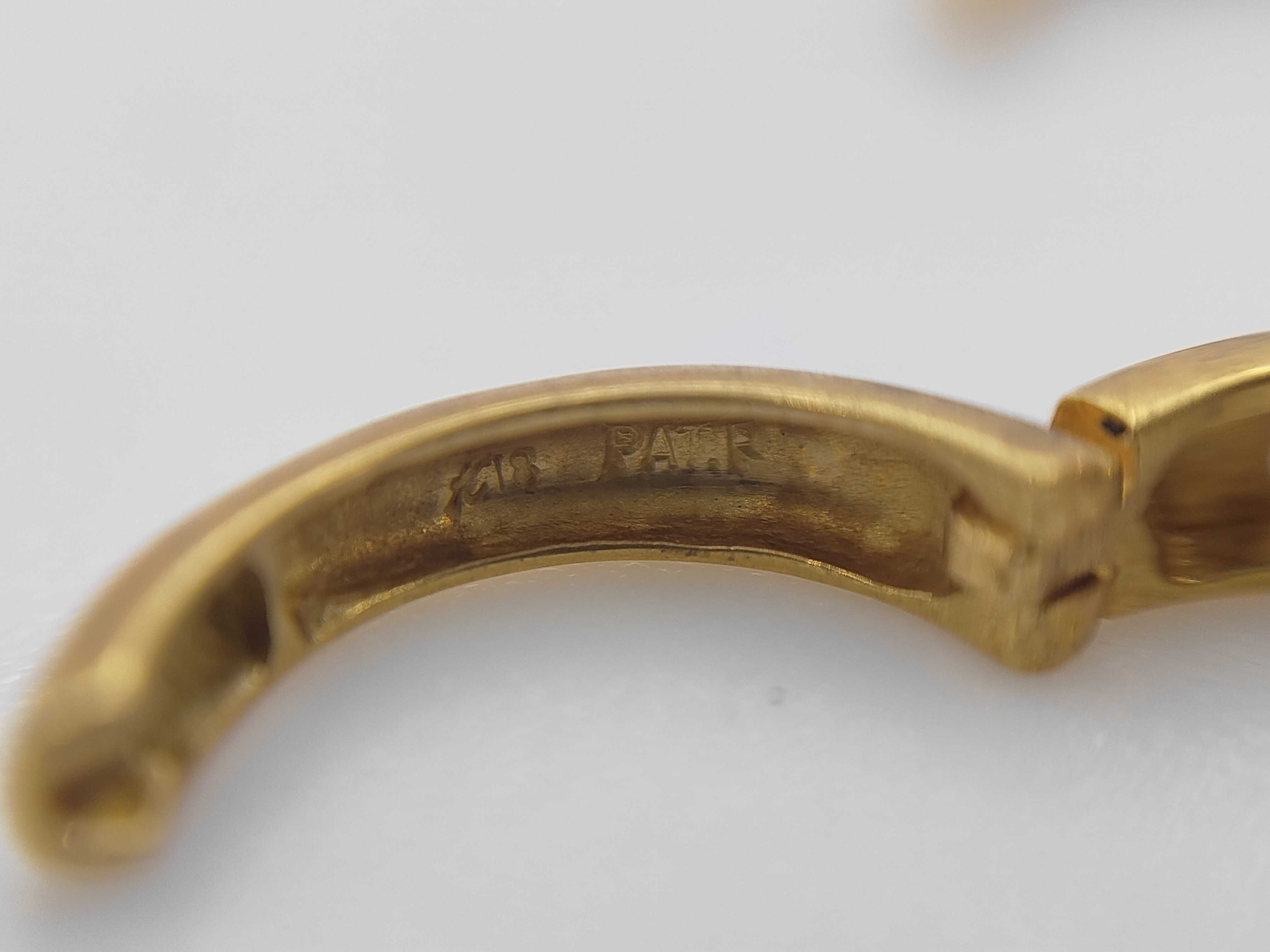 A Pair of 18 Karat Yellow Gold and Diamond Channel-Set Huggie Hoop Earrings