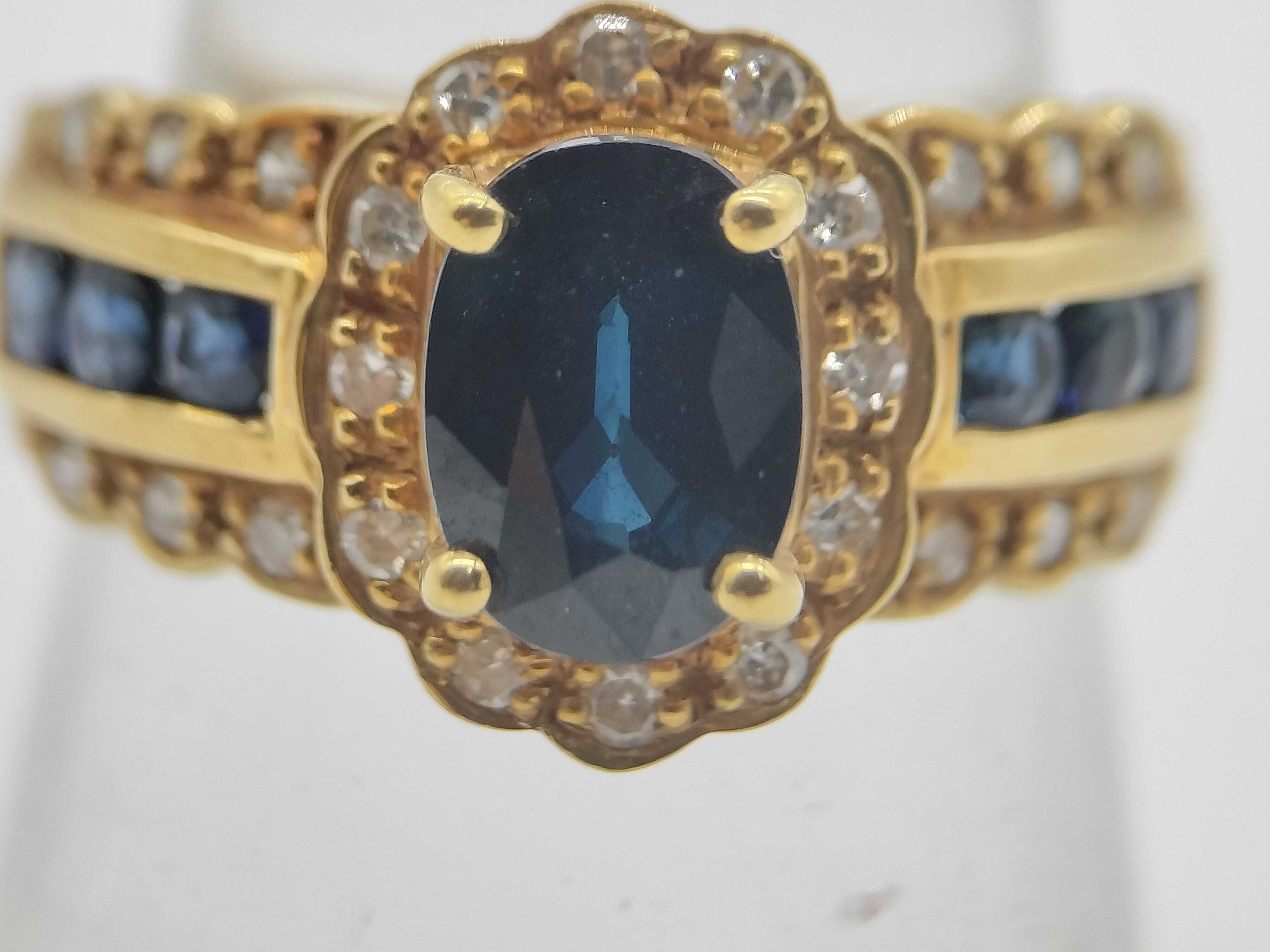18K Yellow Gold 1.33 Carat Natural Sapphire and Diamond Halo Ring