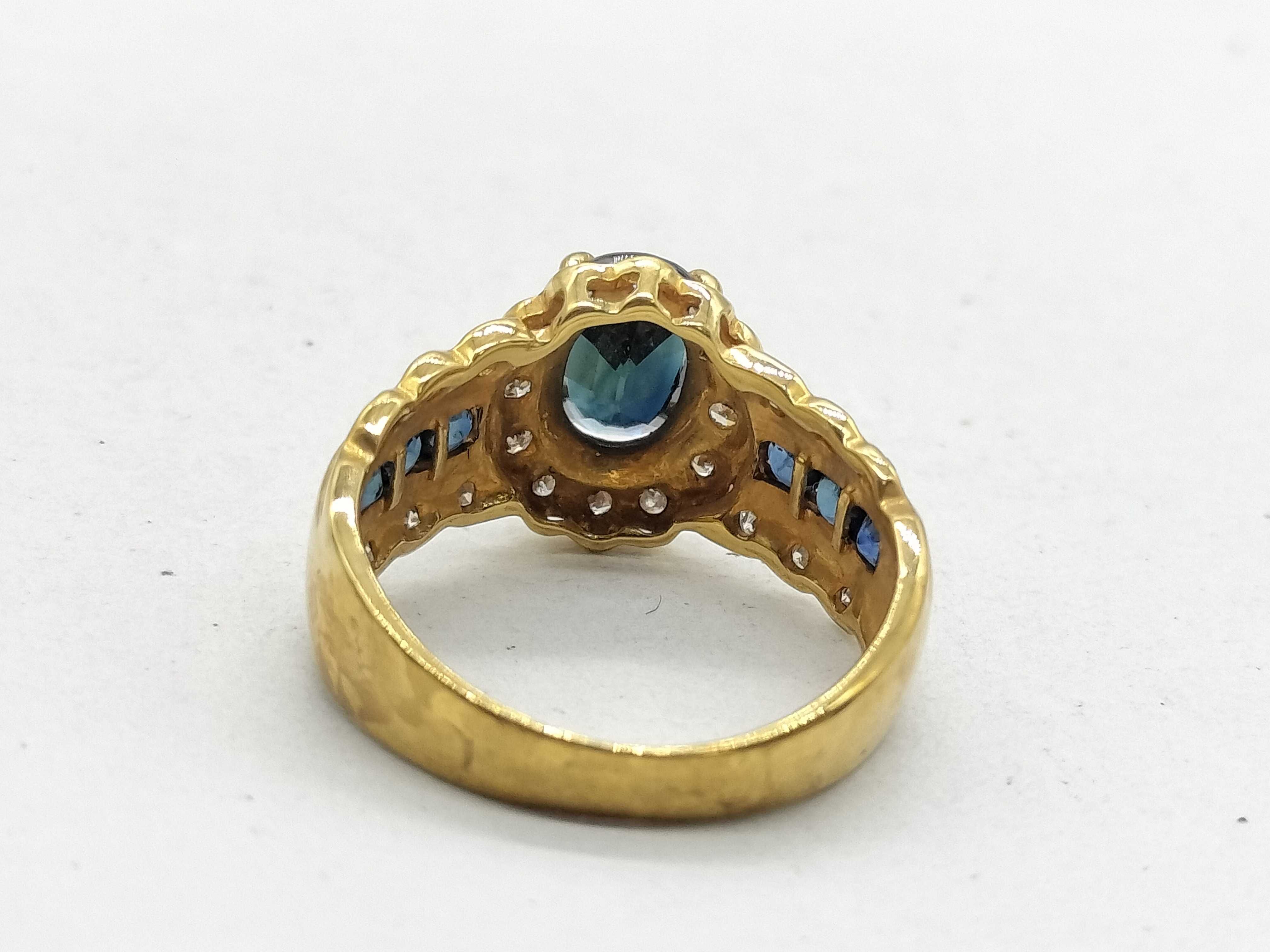 18K Yellow Gold 1.33 Carat Natural Sapphire and Diamond Halo Ring