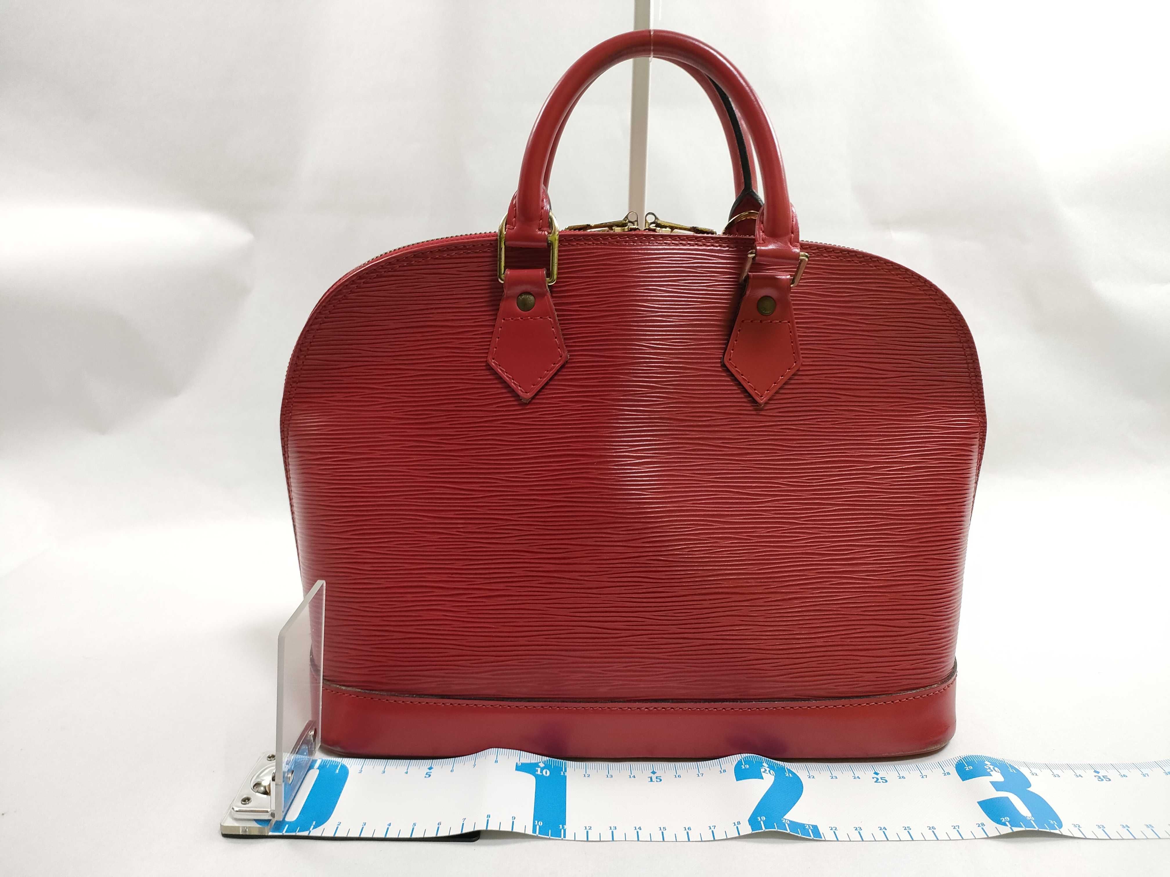 Louis Vuitton Epi Leather Alma PM Handbag in Castillane Red