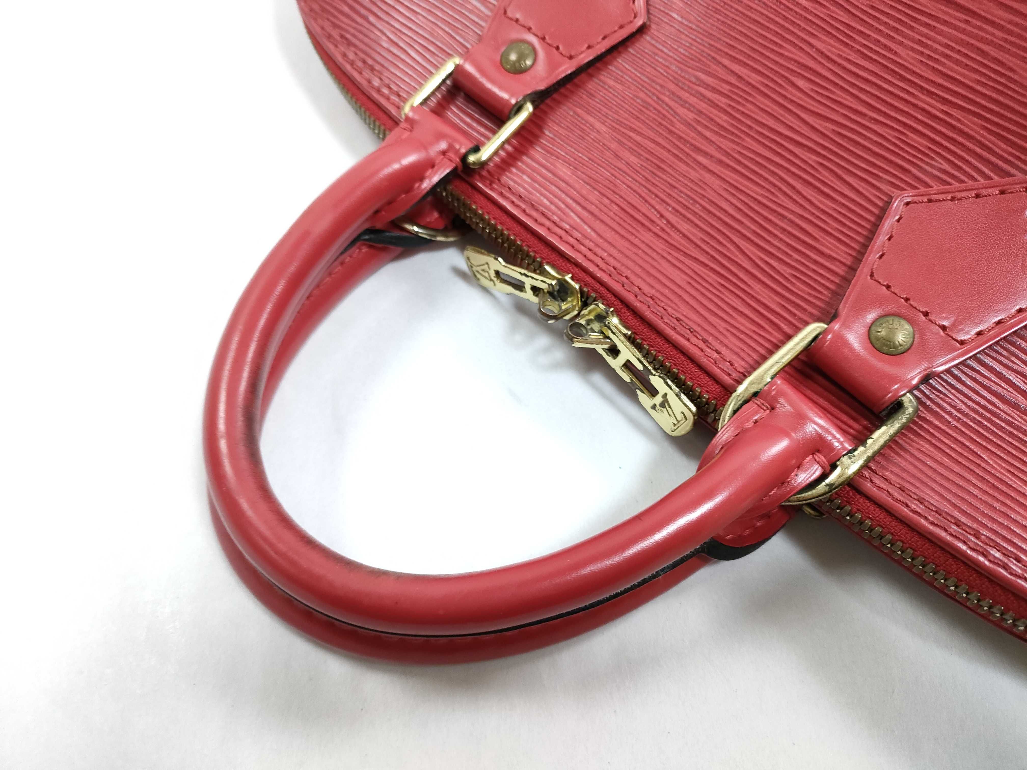 Louis Vuitton Epi Leather Alma PM Handbag in Castillane Red