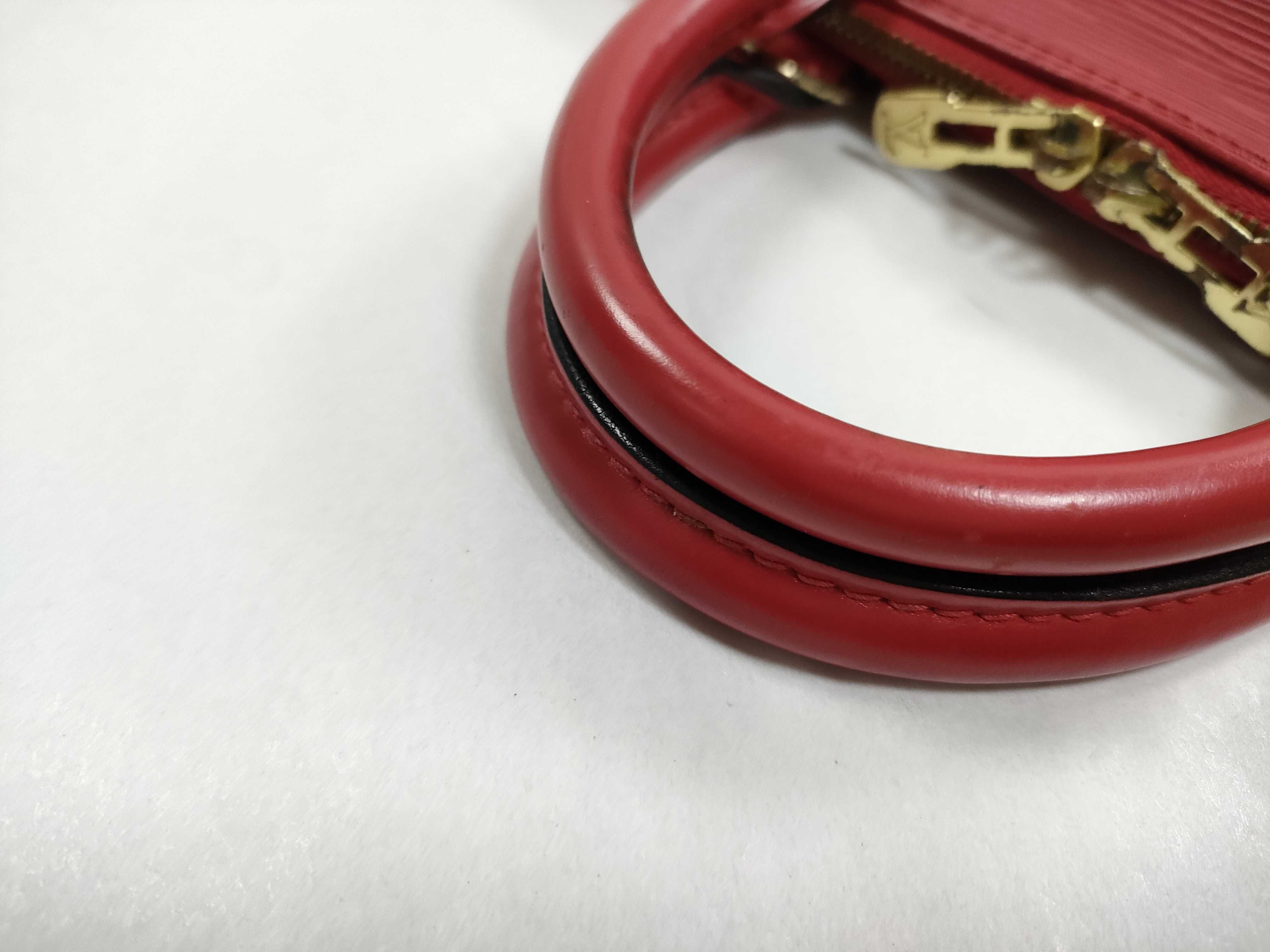Louis Vuitton Epi Leather Alma PM Handbag in Castillane Red