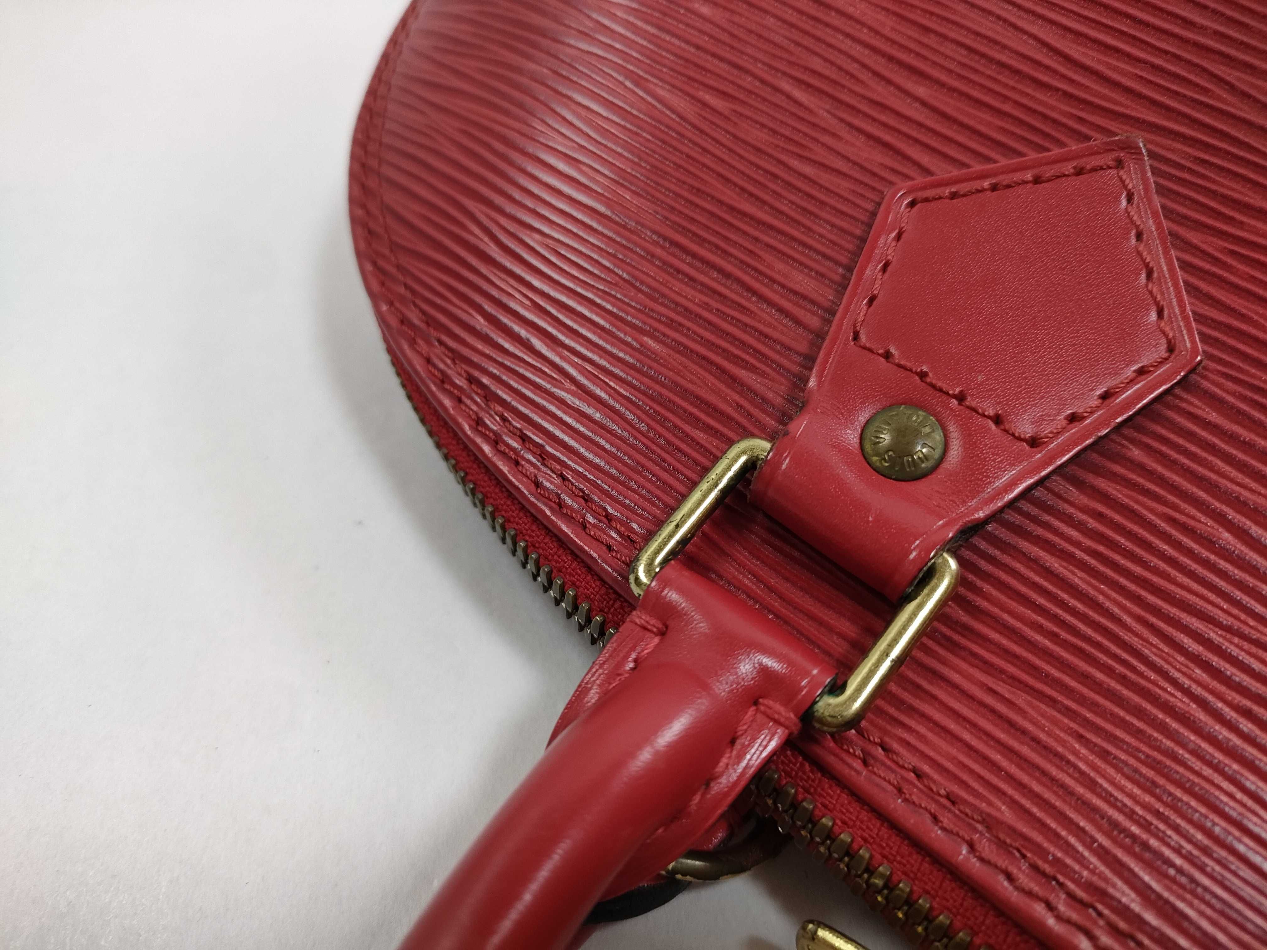 Louis Vuitton Epi Leather Alma PM Handbag in Castillane Red