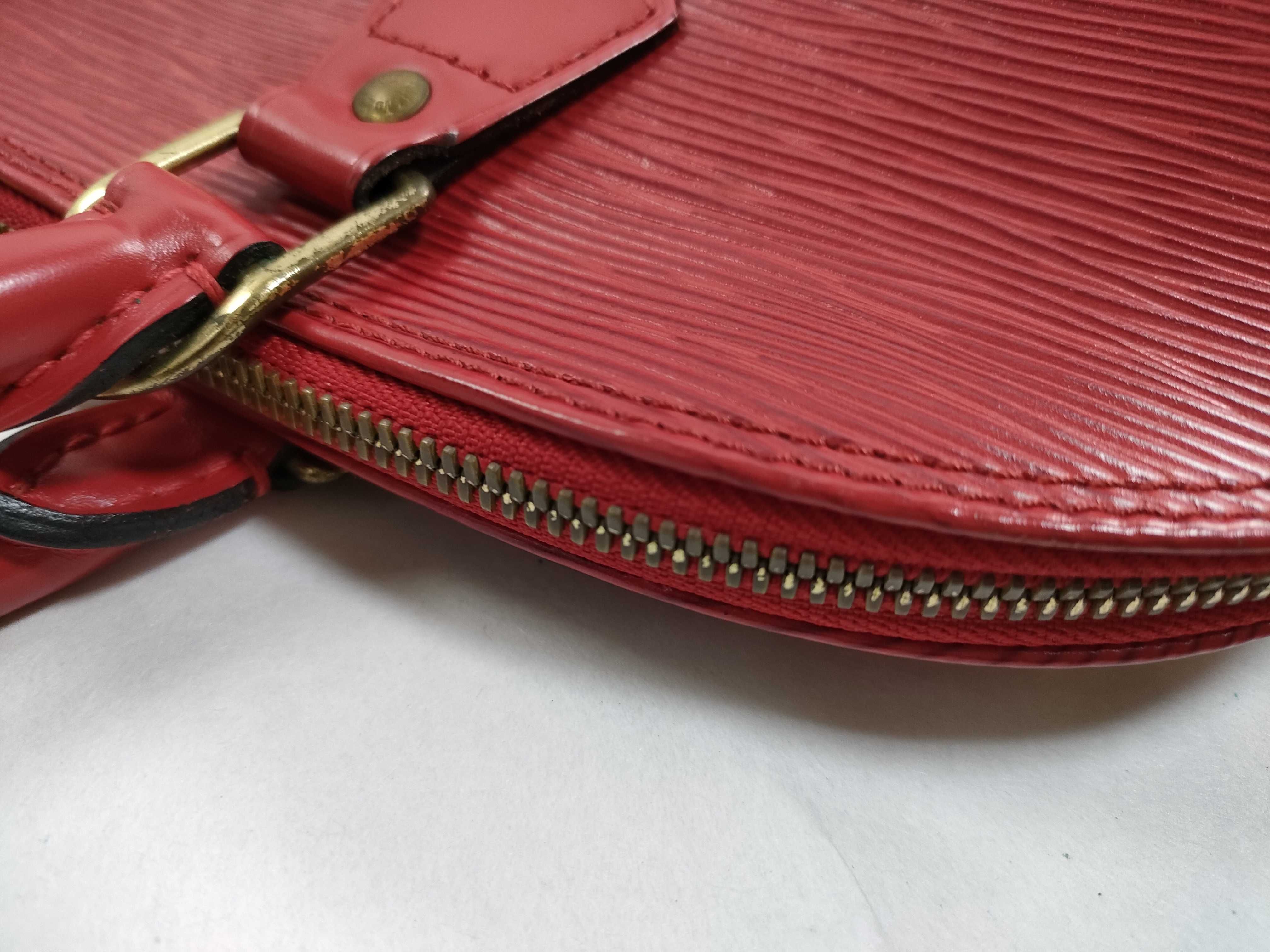 Louis Vuitton Epi Leather Alma PM Handbag in Castillane Red
