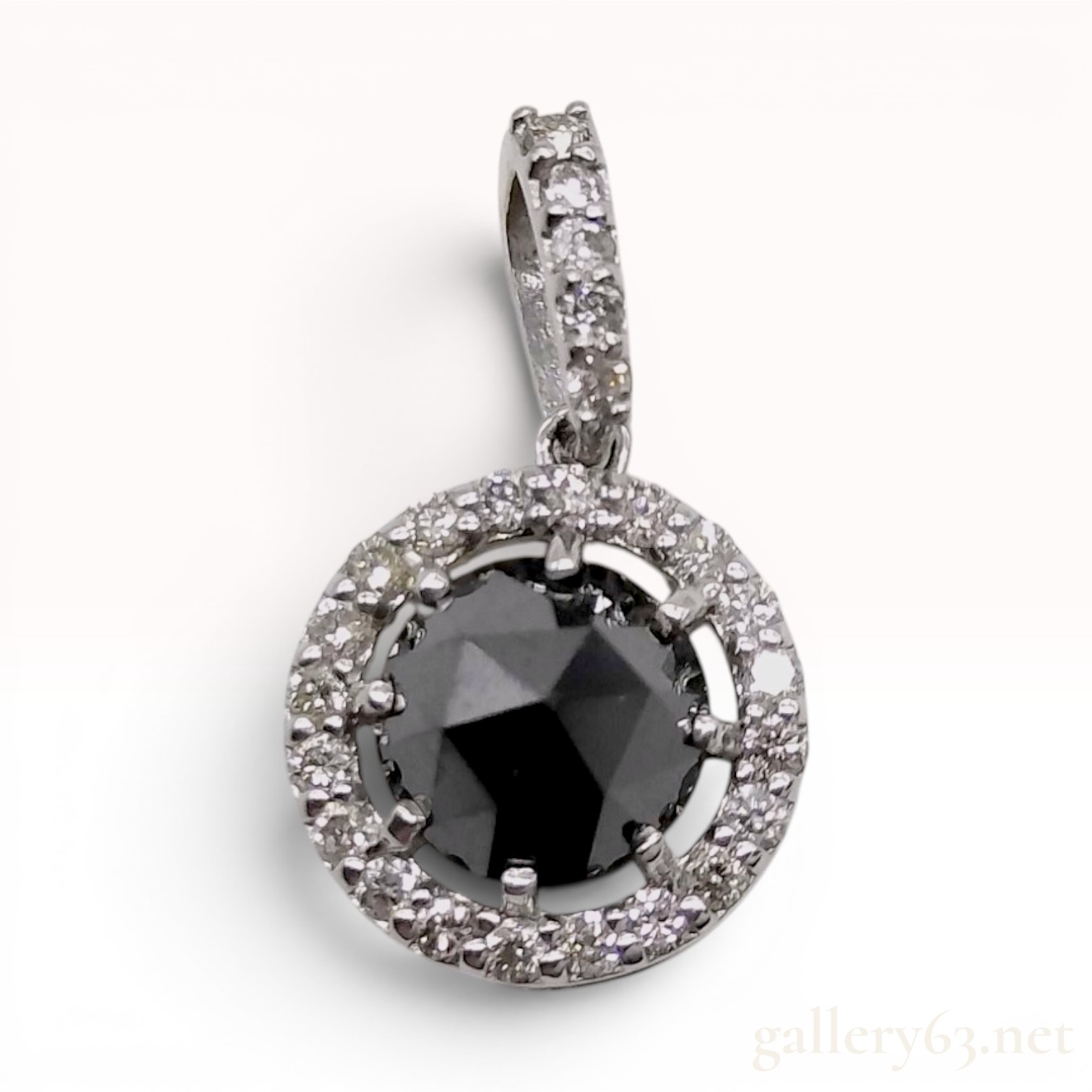 18 Karat White Gold Black Diamond and Diamond Halo Pendant