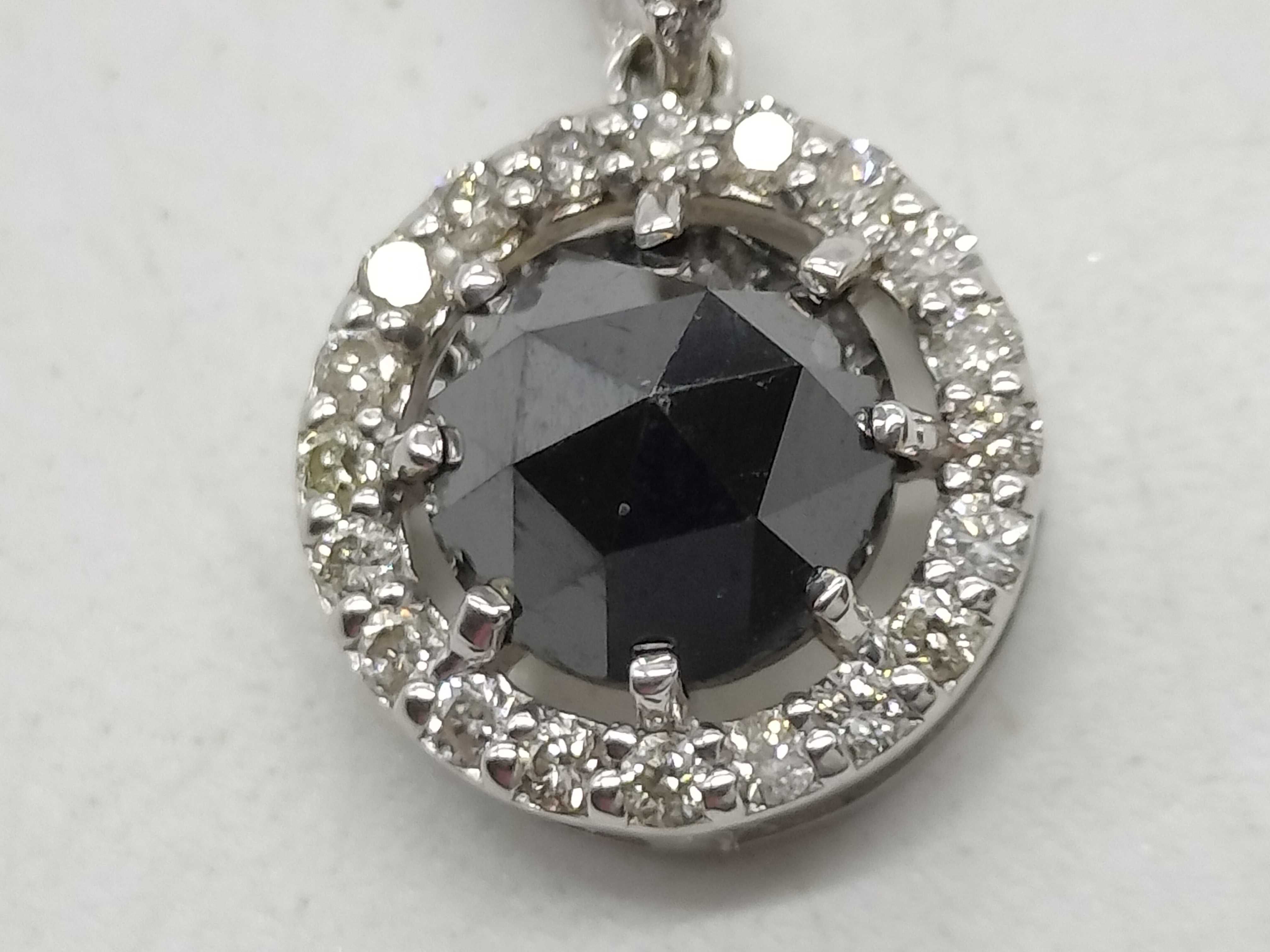 18 Karat White Gold Black Diamond and Diamond Halo Pendant