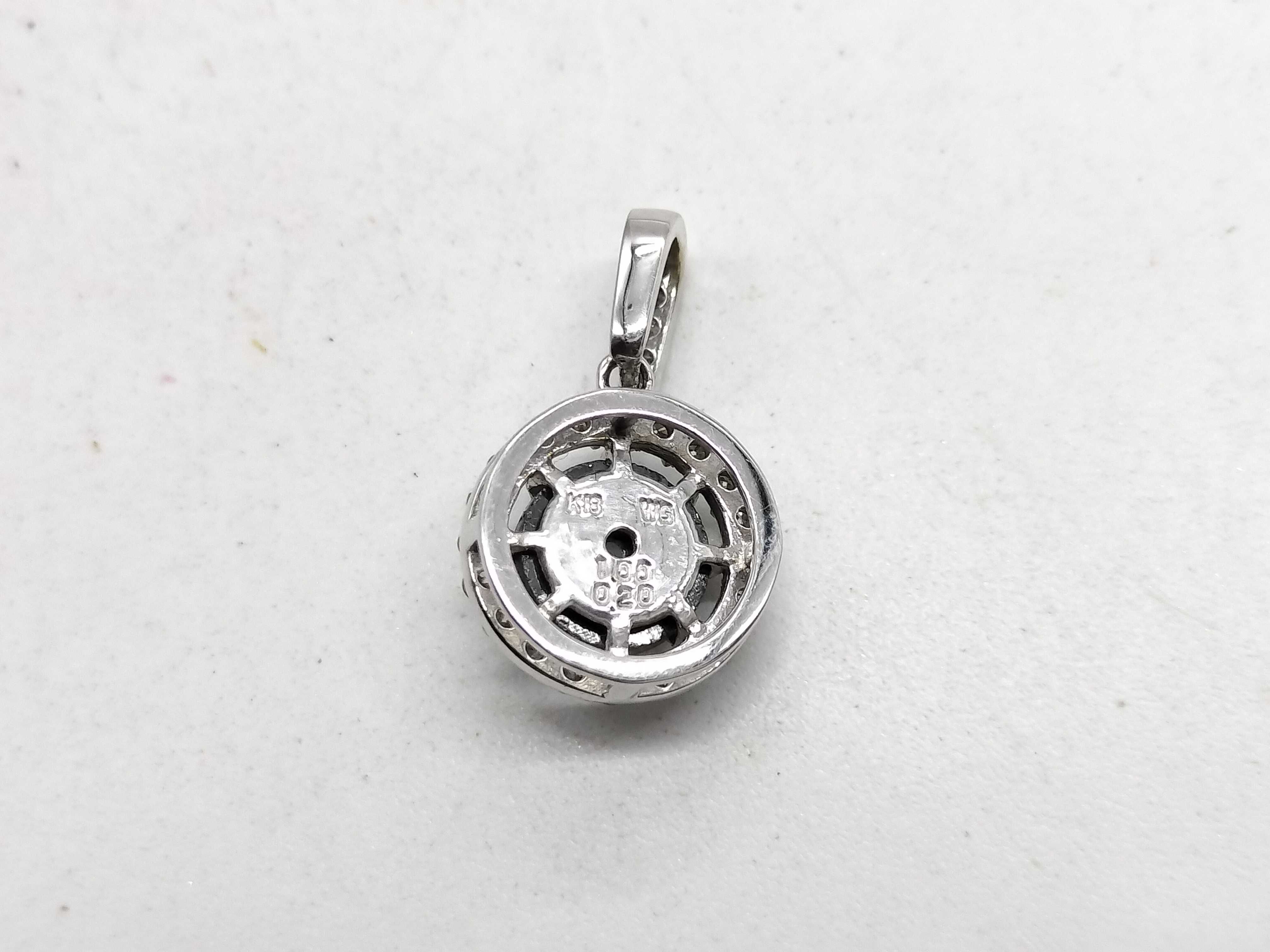 18 Karat White Gold Black Diamond and Diamond Halo Pendant