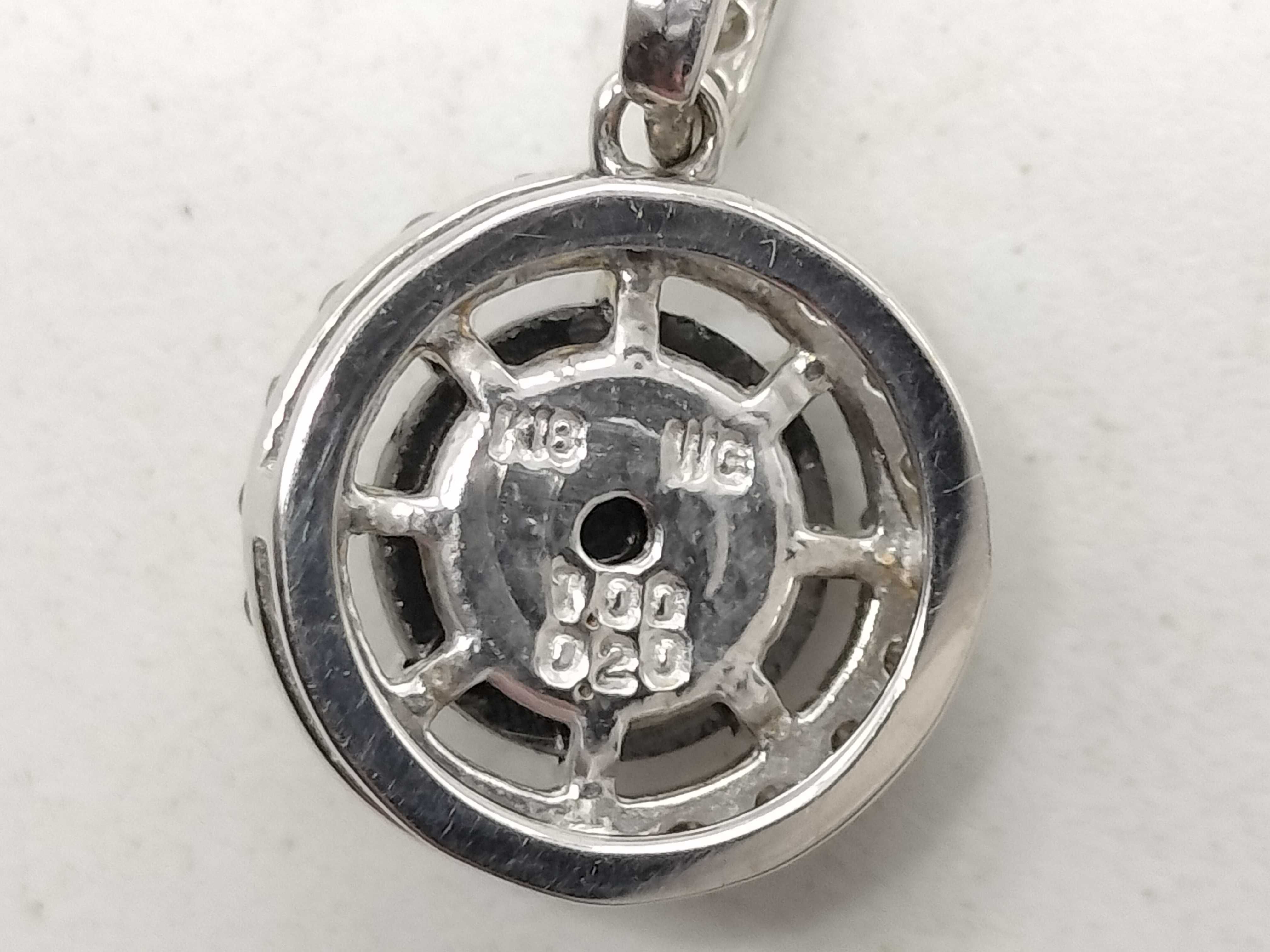 18 Karat White Gold Black Diamond and Diamond Halo Pendant