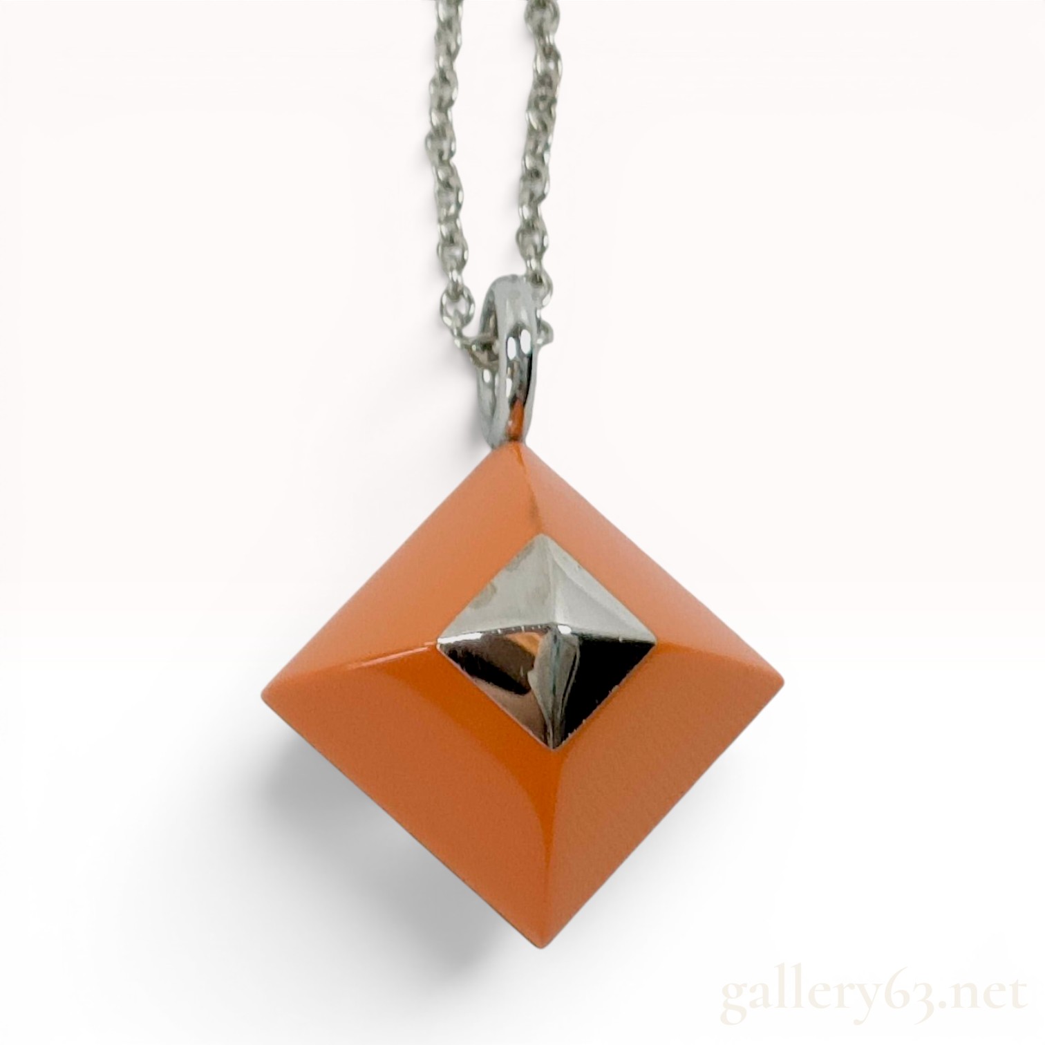 Hermes Medor Cupidon Orange Enamel and Silver Tone Pendant Necklace