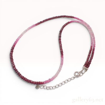 Sterling Silver Ombre Ruby and Pink Sapphire Beaded Necklace. A single strand beaded necklace 
