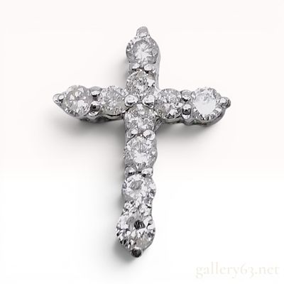 Natural Diamond Cross Pendant in Pt900 Platinum. A platinum cross pendant featuring eleven round 