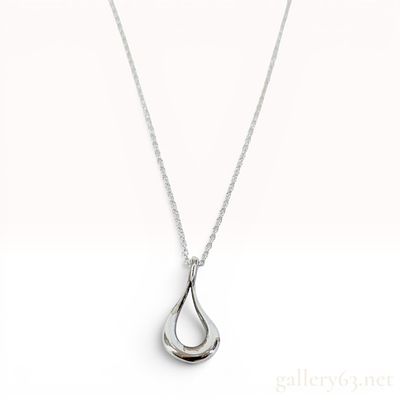 Tiffany and Co. Sterling Silver Elsa Peretti Open Teardrop Pendant Necklace. A sterling silver 