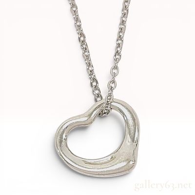 Tiffany & Co. Elsa Peretti Sterling Silver Open Heart Pendant Necklace. A Tiffany & Co. sterling 