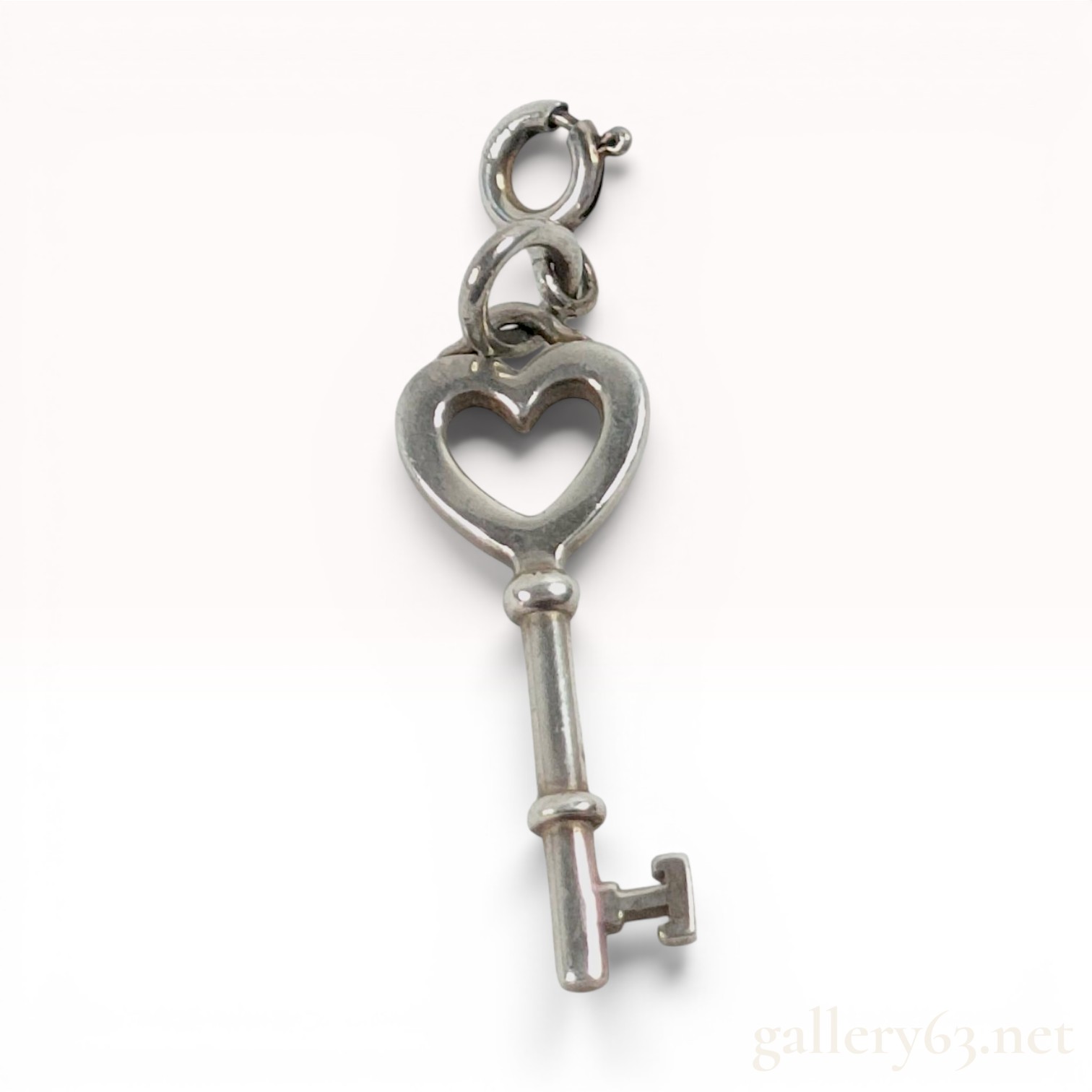 Tiffany and Co. Sterling Silver Tiffany Keys Mini Heart Key Charm Pendant