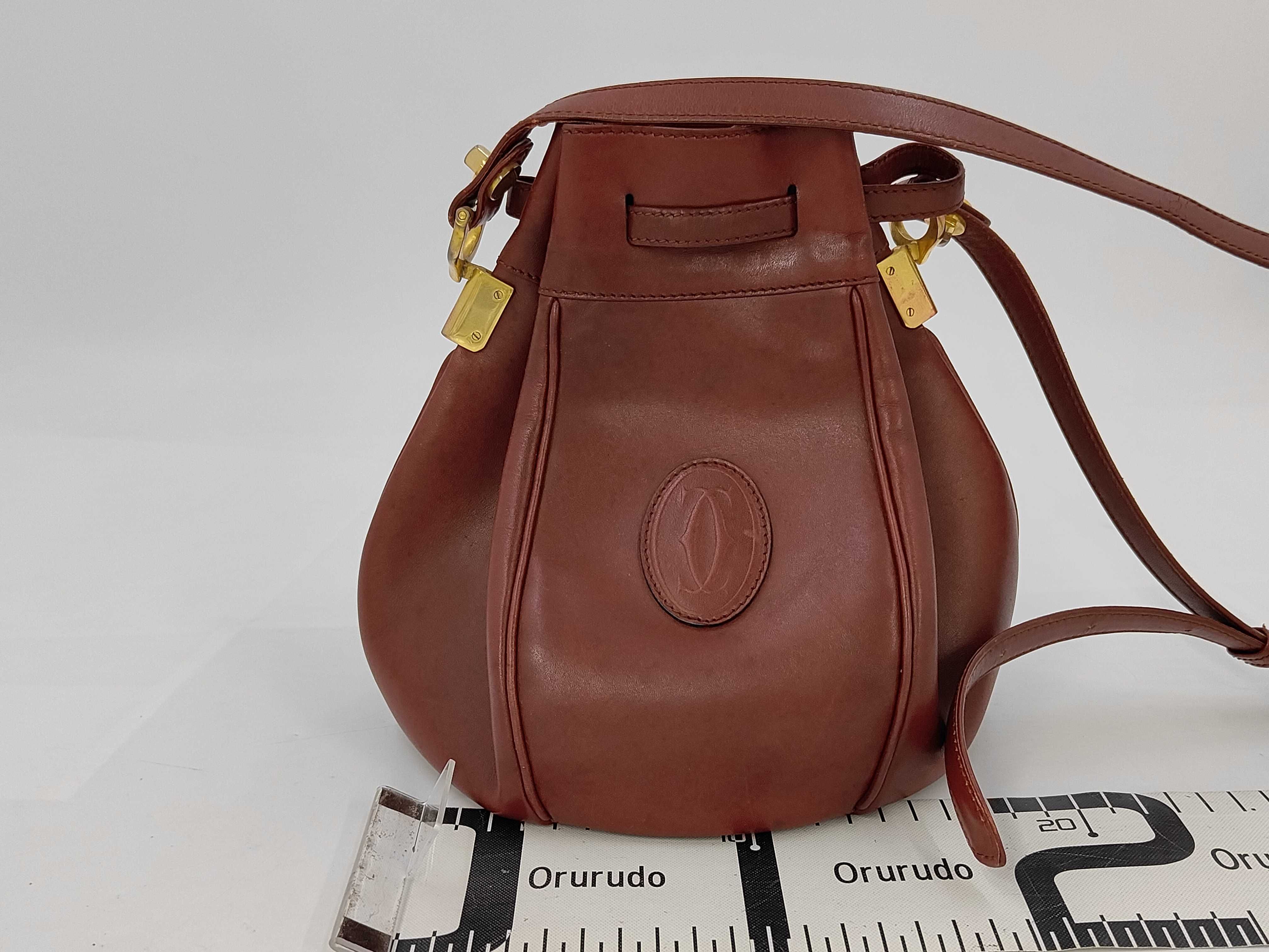 Must de Cartier Burgundy Leather Bucket Bag