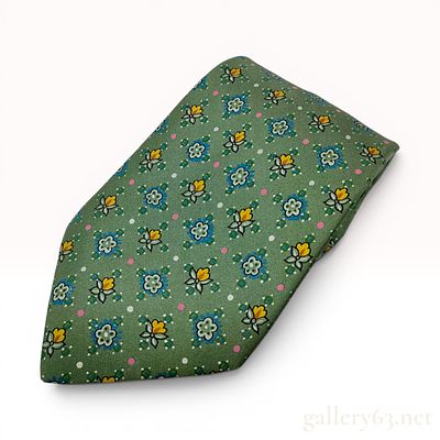 Hermes Silk Micro Floral Pattern Necktie. A Hermes necktie crafted from 100 percent silk in a 