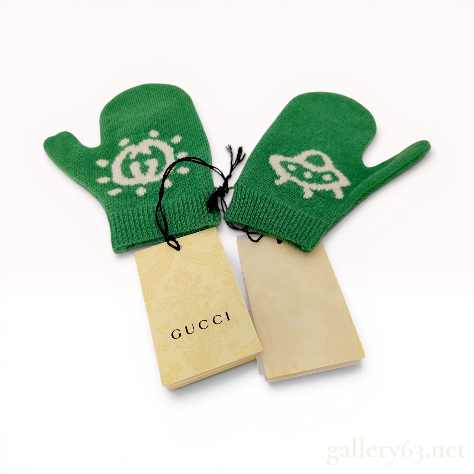 A Pair of Gucci Child's Green Wool Mittens with GG and UFO Intarsia
