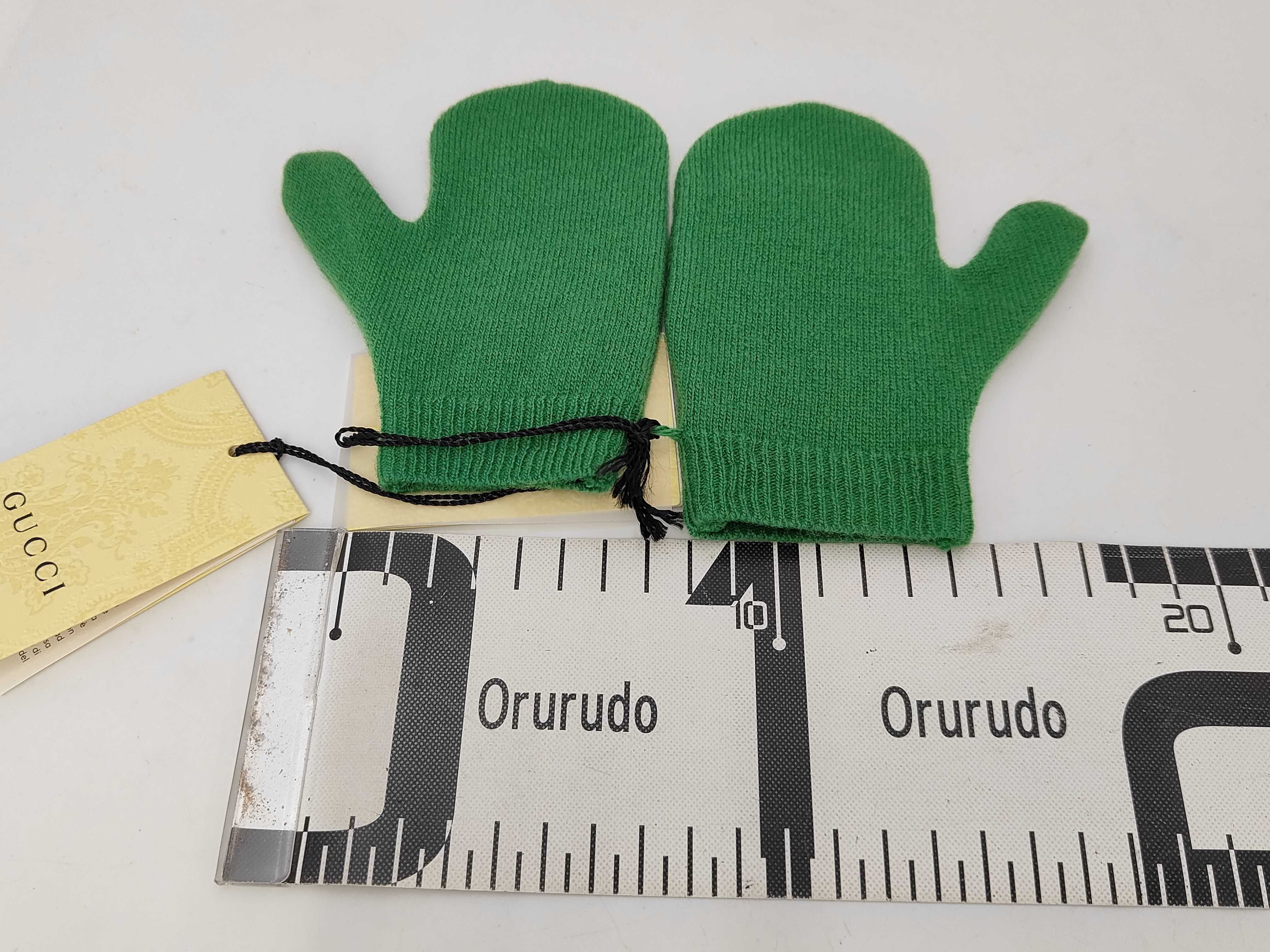 A Pair of Gucci Child's Green Wool Mittens with GG and UFO Intarsia