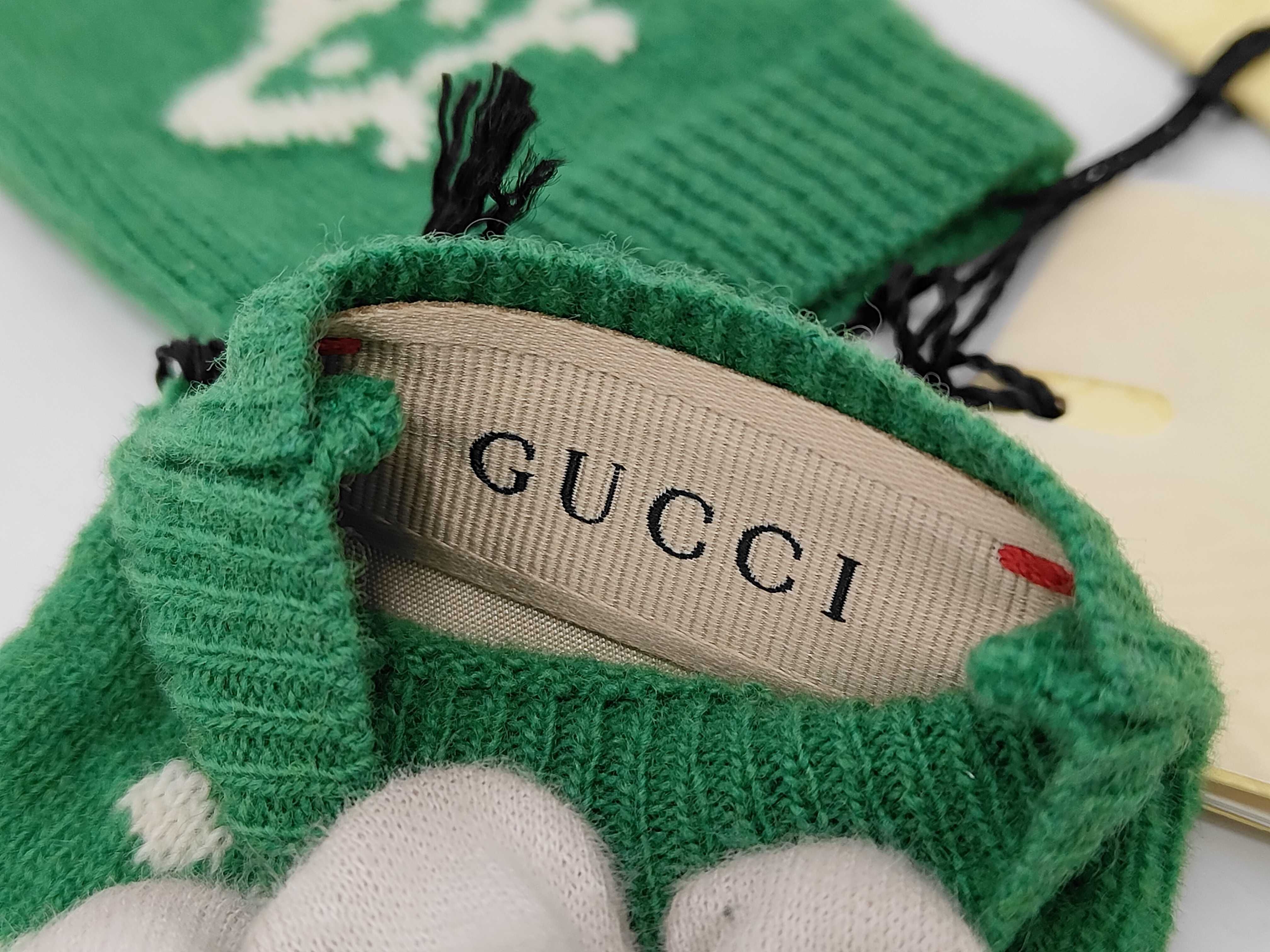 A Pair of Gucci Child's Green Wool Mittens with GG and UFO Intarsia